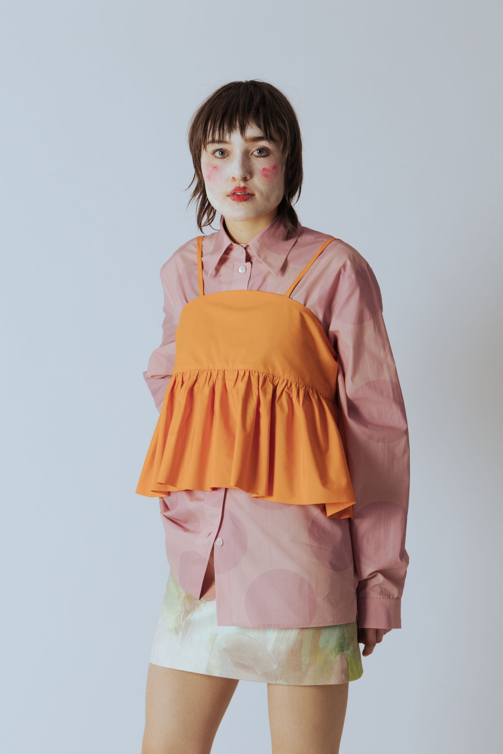 pink shirt orange top mini skirt
