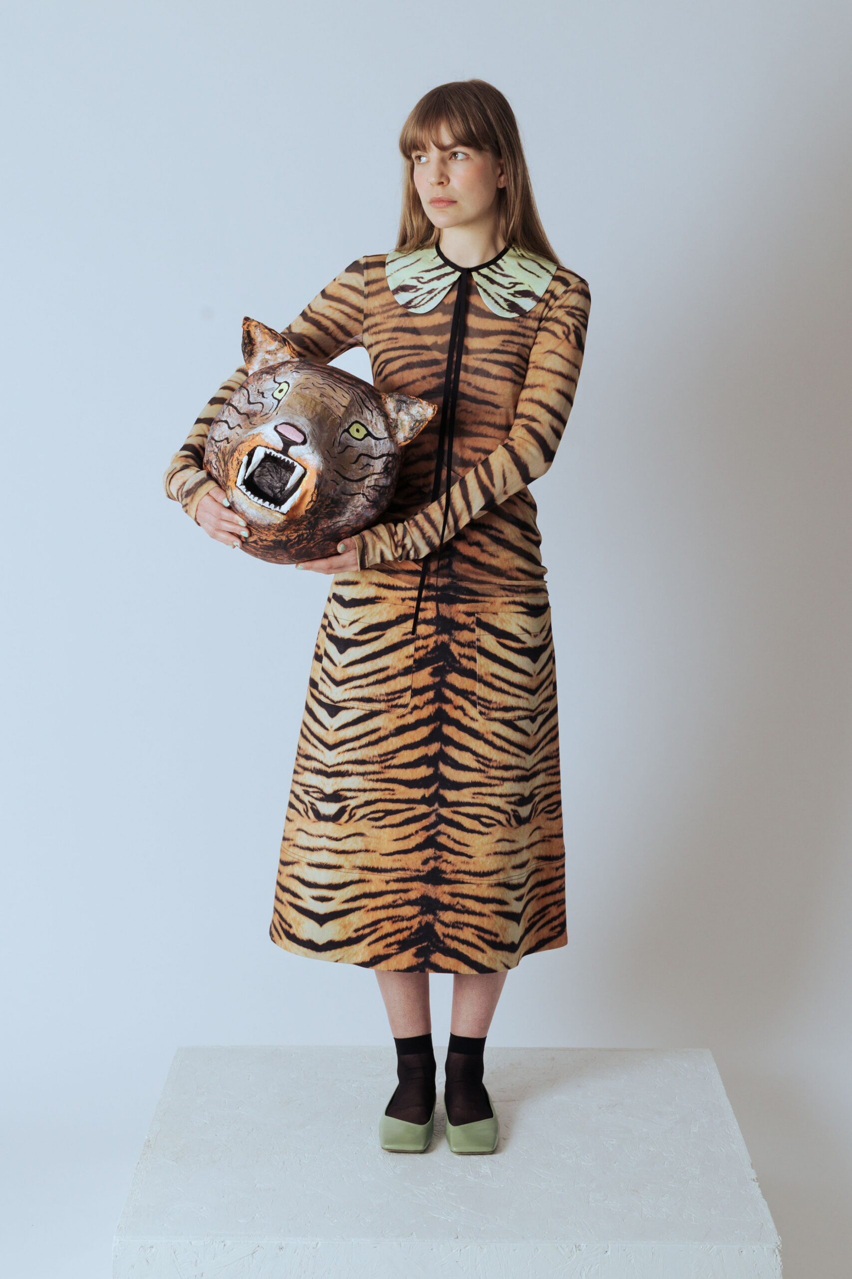 brown printed midi dress with green shoes