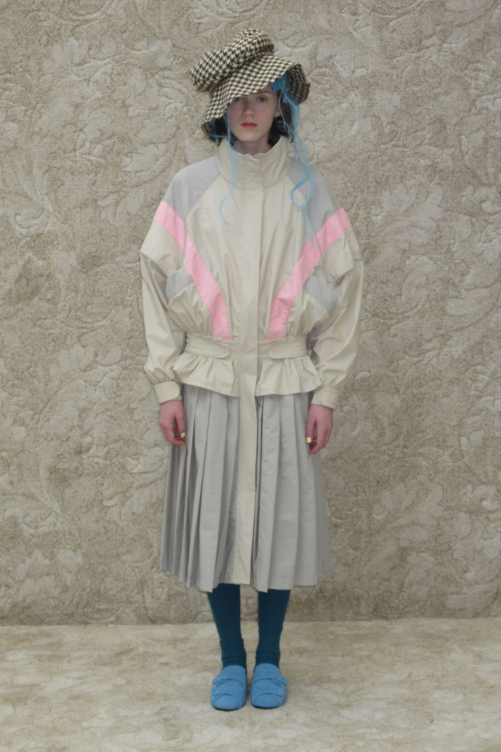 beige coat with pink accents