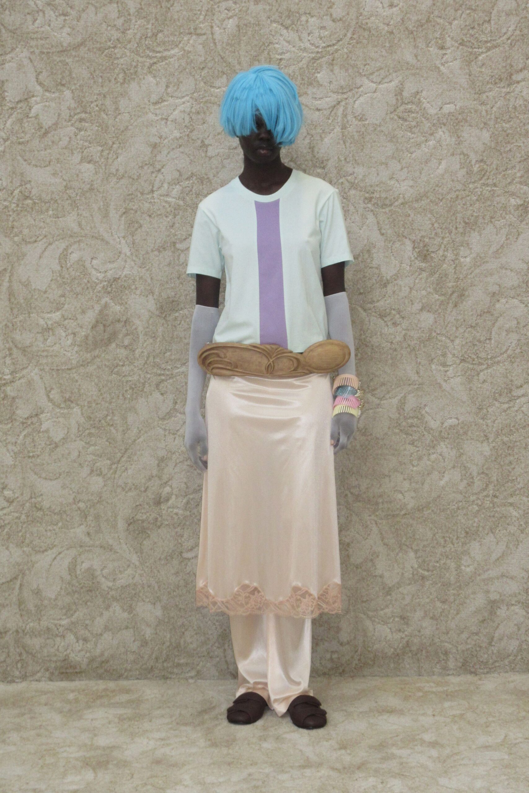 light blue t-shirt with pink skirt