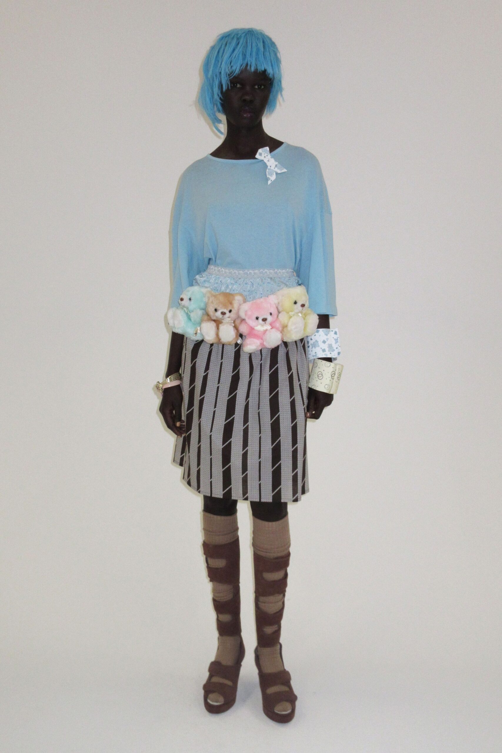 blue relaxed top gray striped skirt