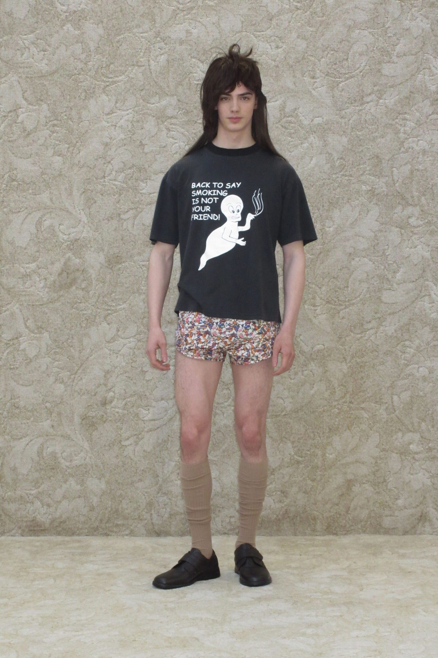 black t-shirt with floral shorts