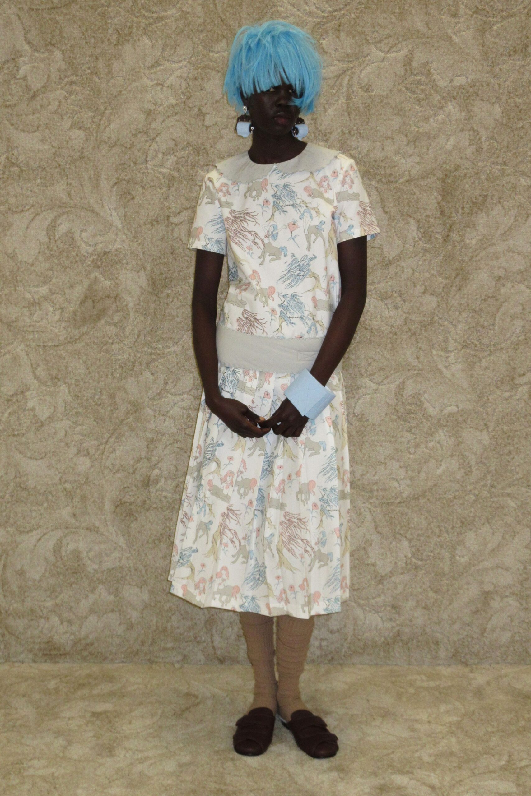white cotton short-sleeve collared fitted printed top