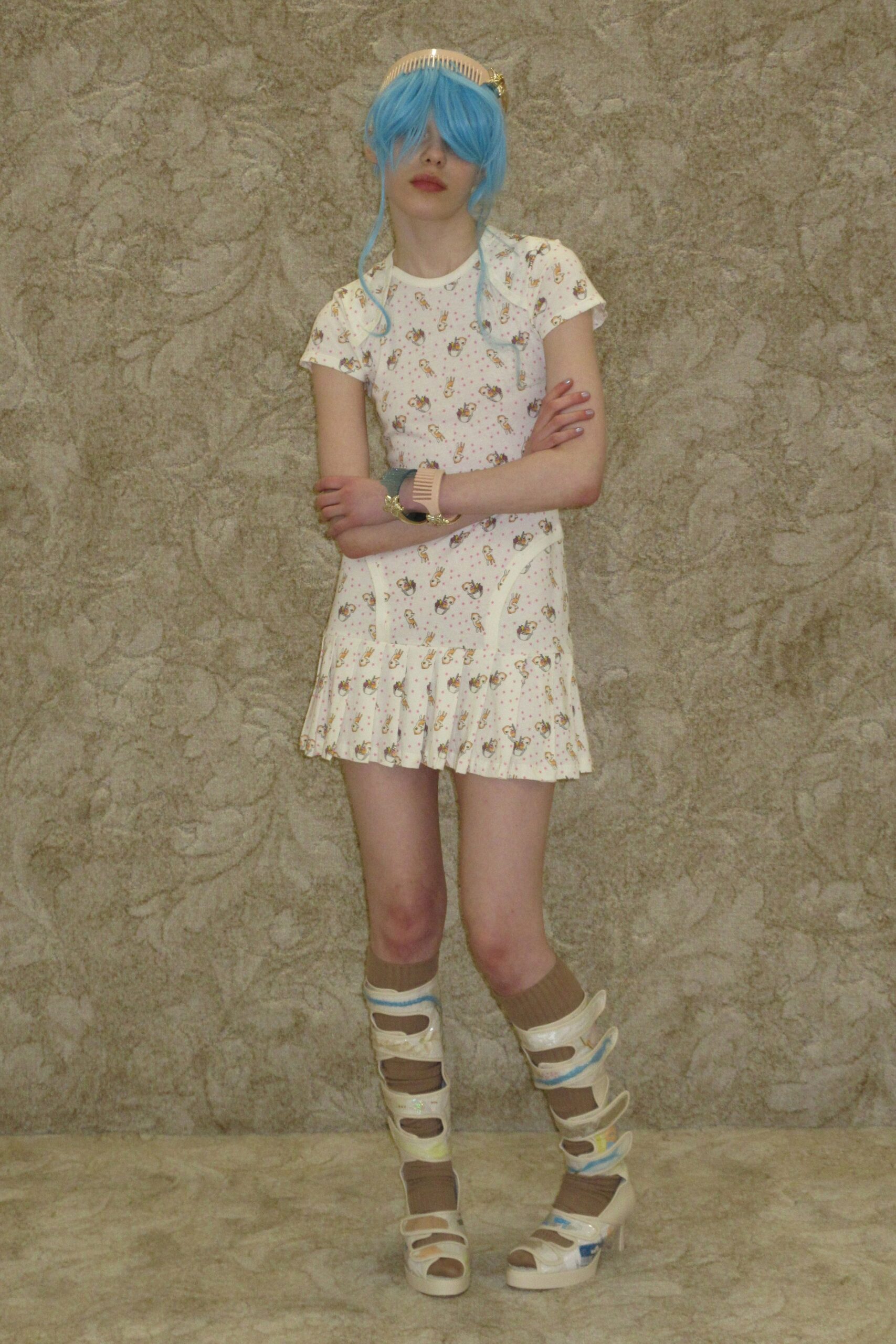 white cotton short-sleeve v-neck fitted pleated flared mini-dress