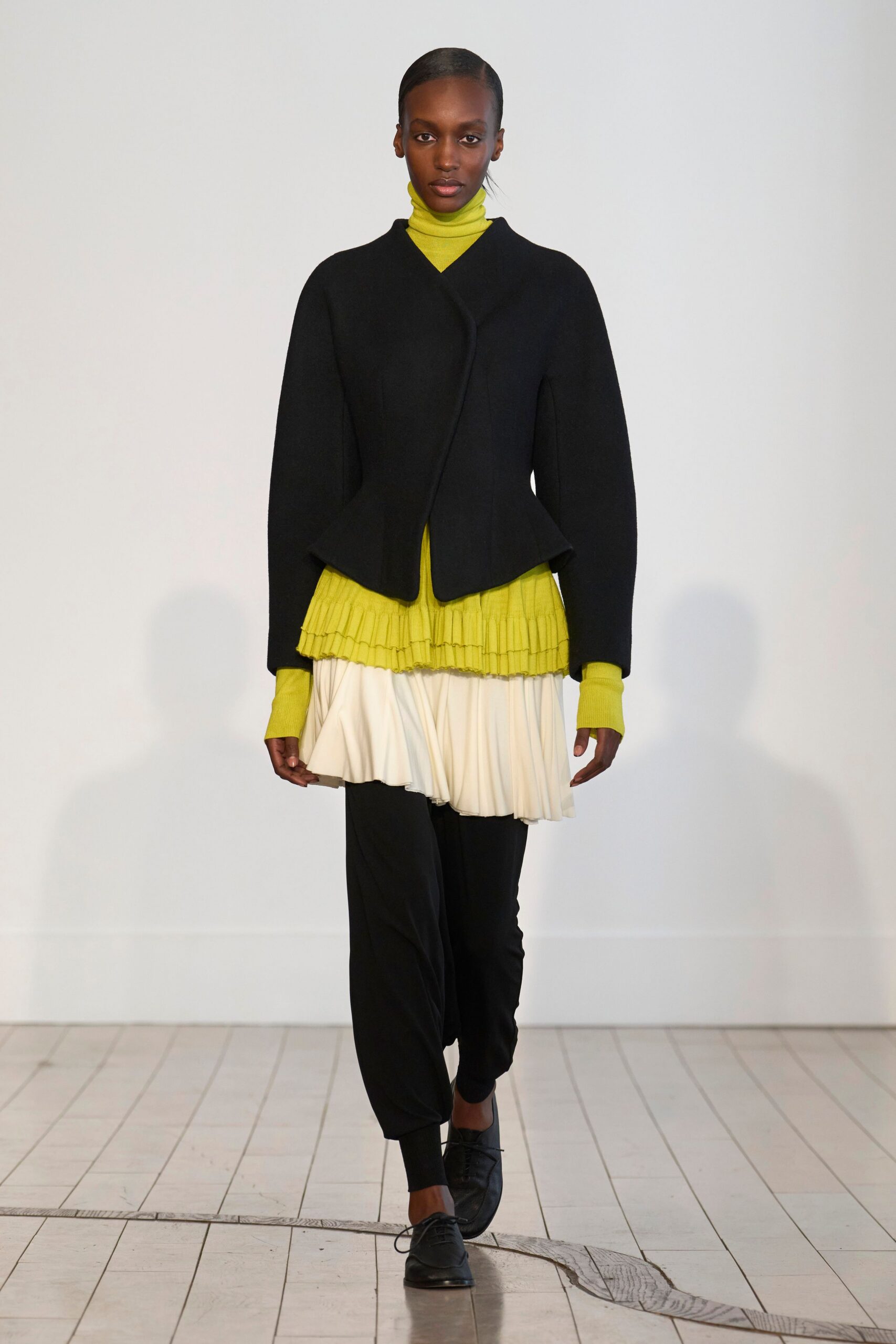 yellow cotton long-sleeve high-neck fitted pleated top