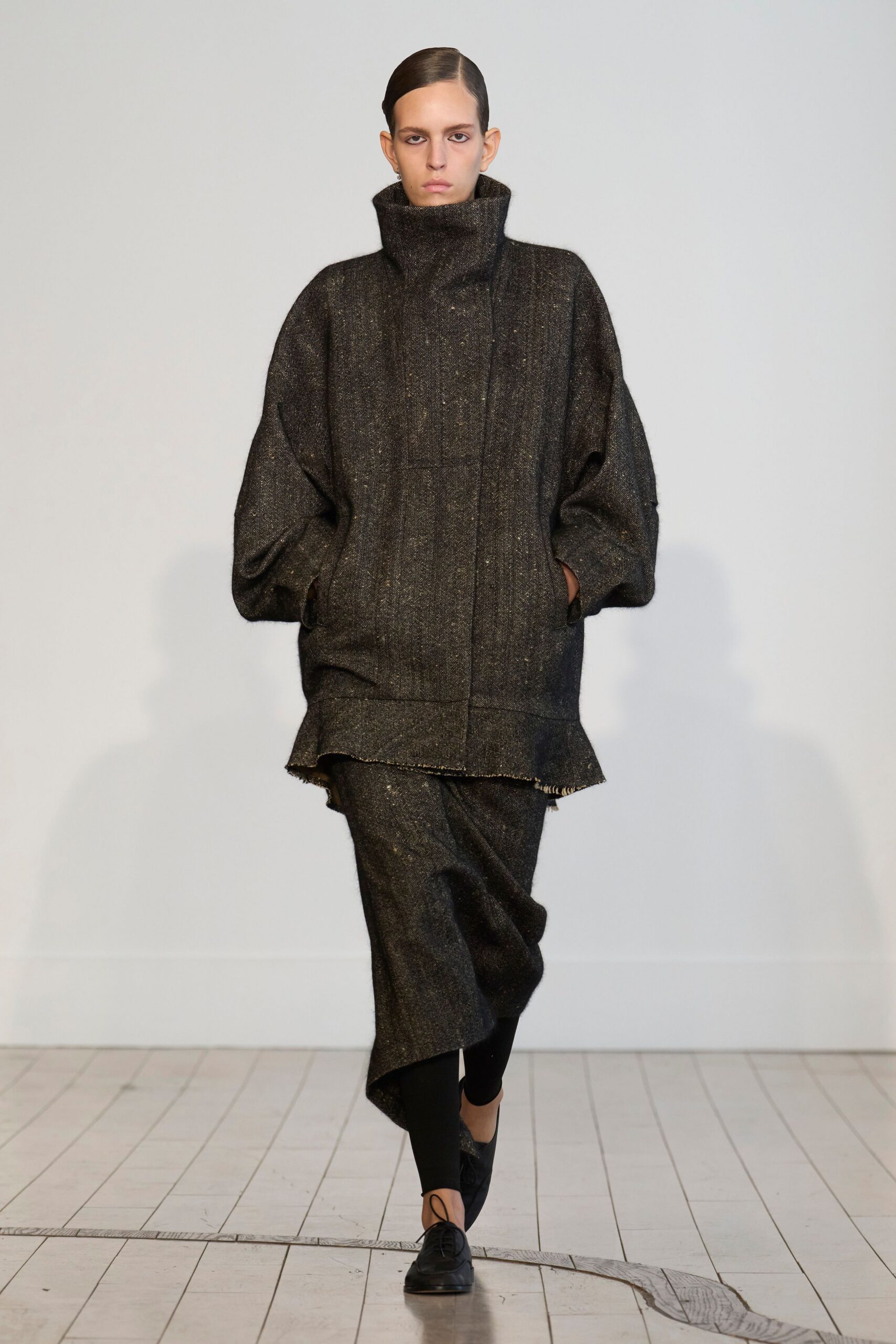 black wool long-sleeve high-neck oversized layered top