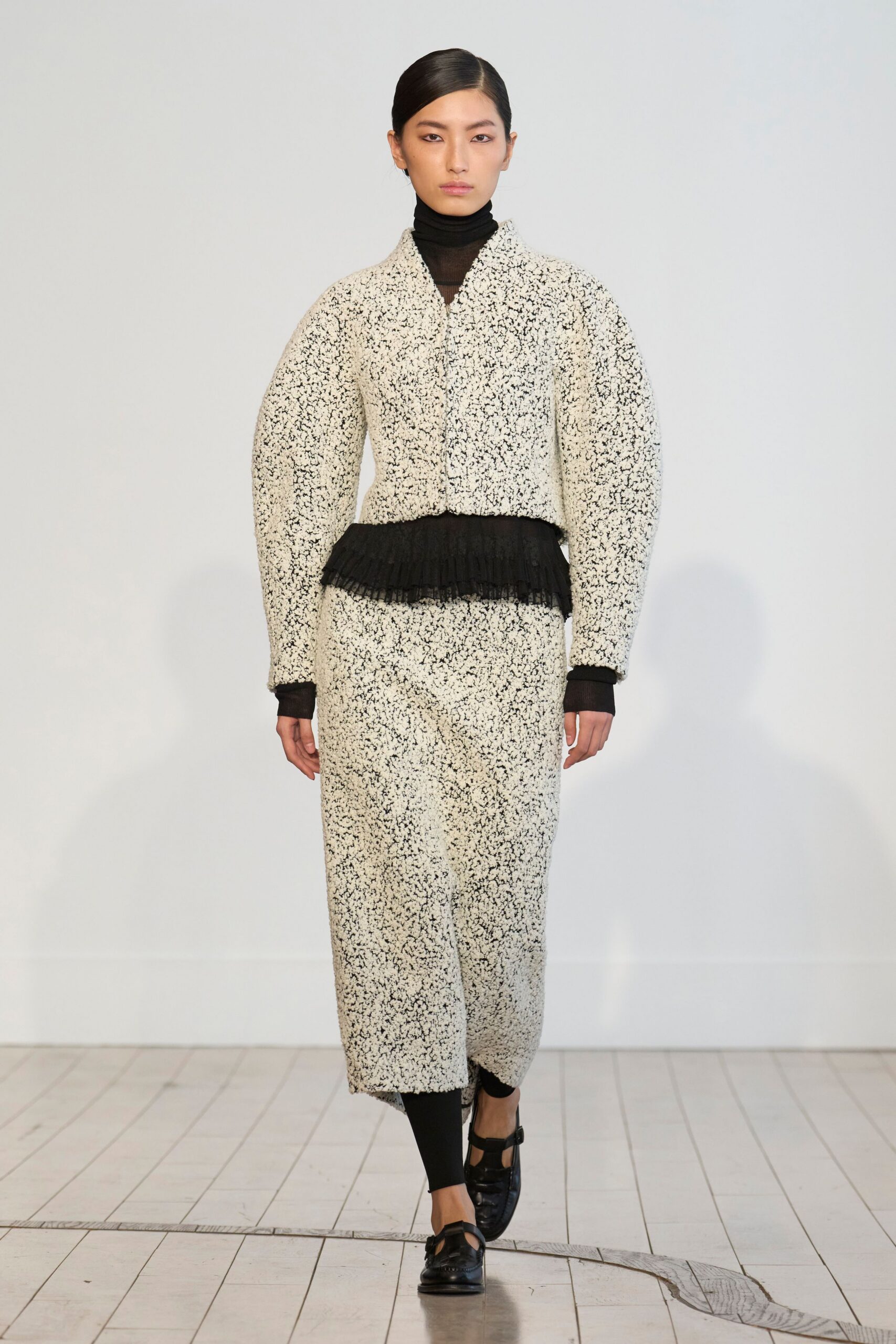 black and white printed coat and skirt