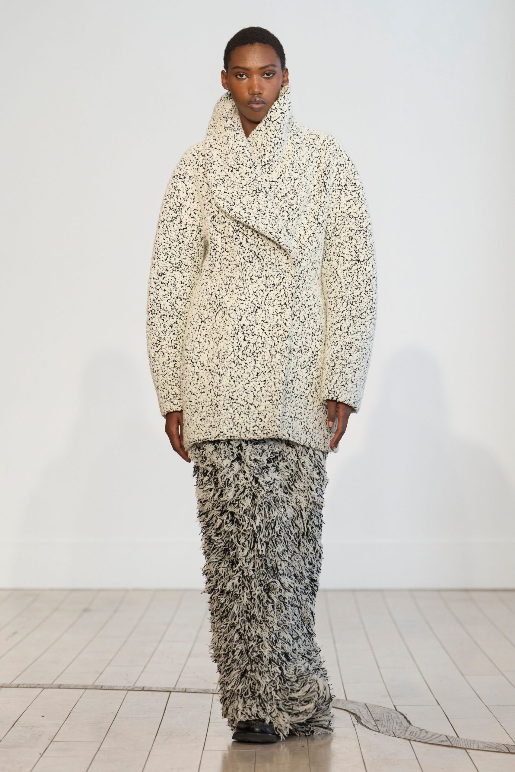 white wool long-sleeve collared oversized textured coat
