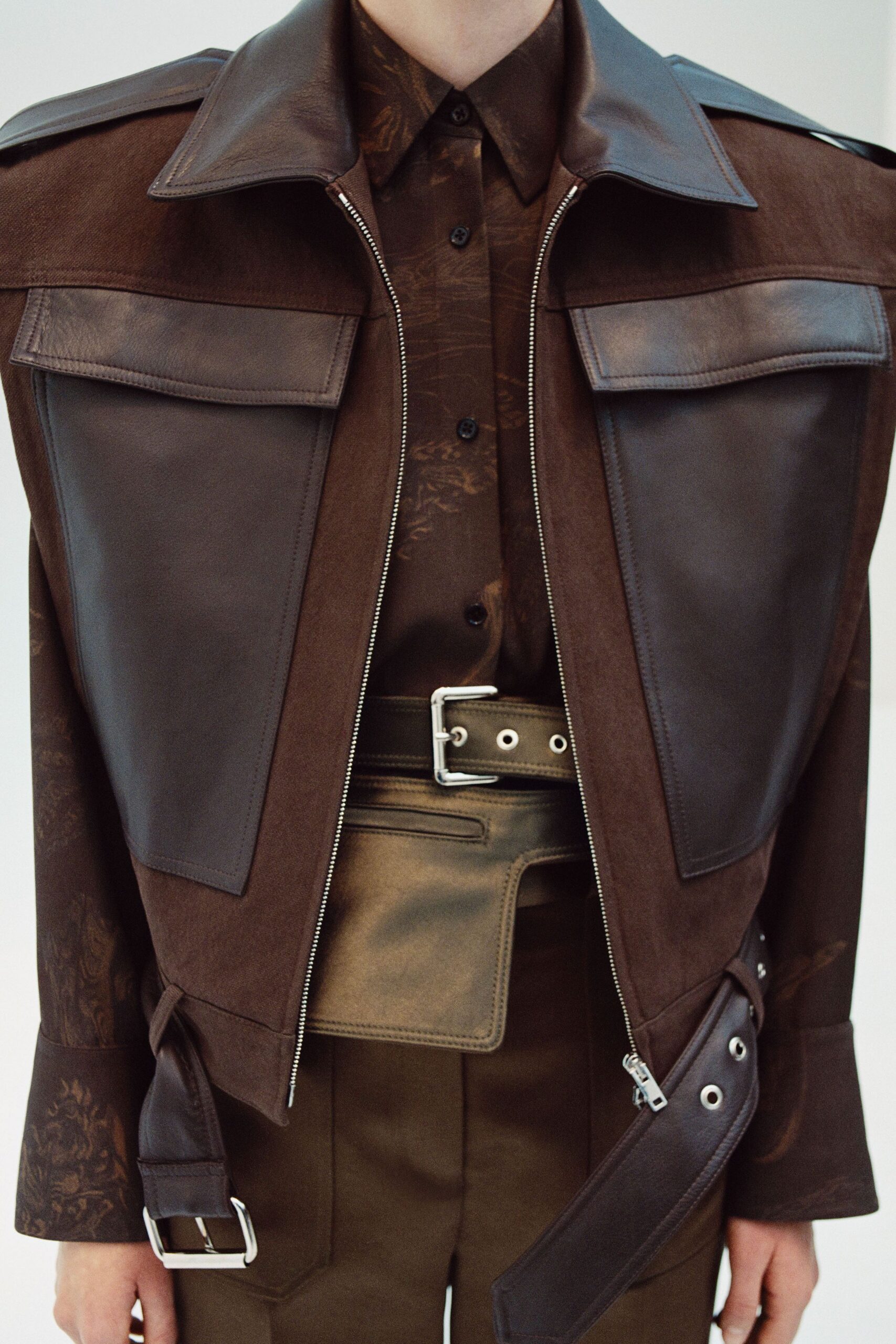 brown leather long-sleeve collared structured zippered pockets jacket