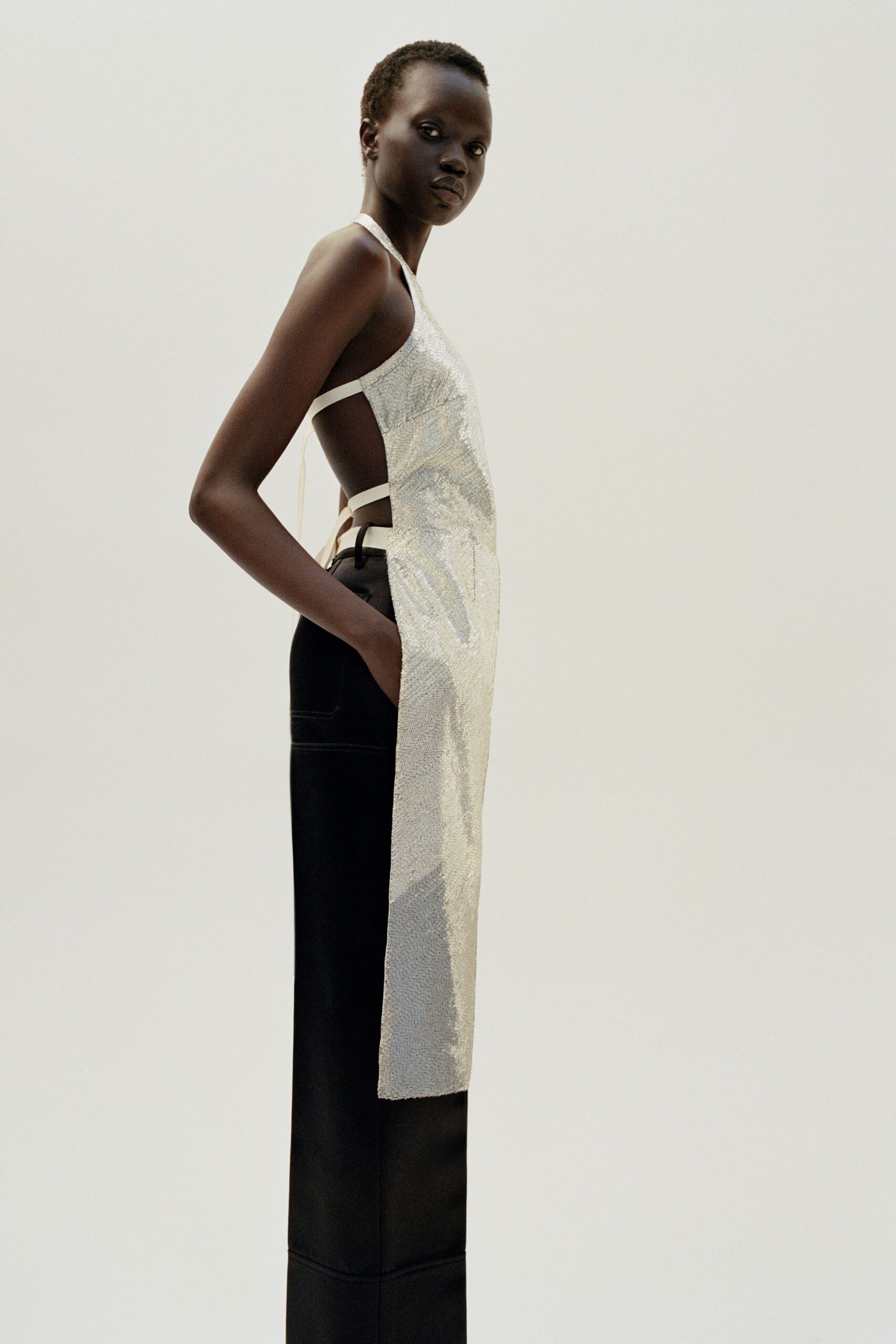 gray silk sleeveless backless fitted draped shiny dress