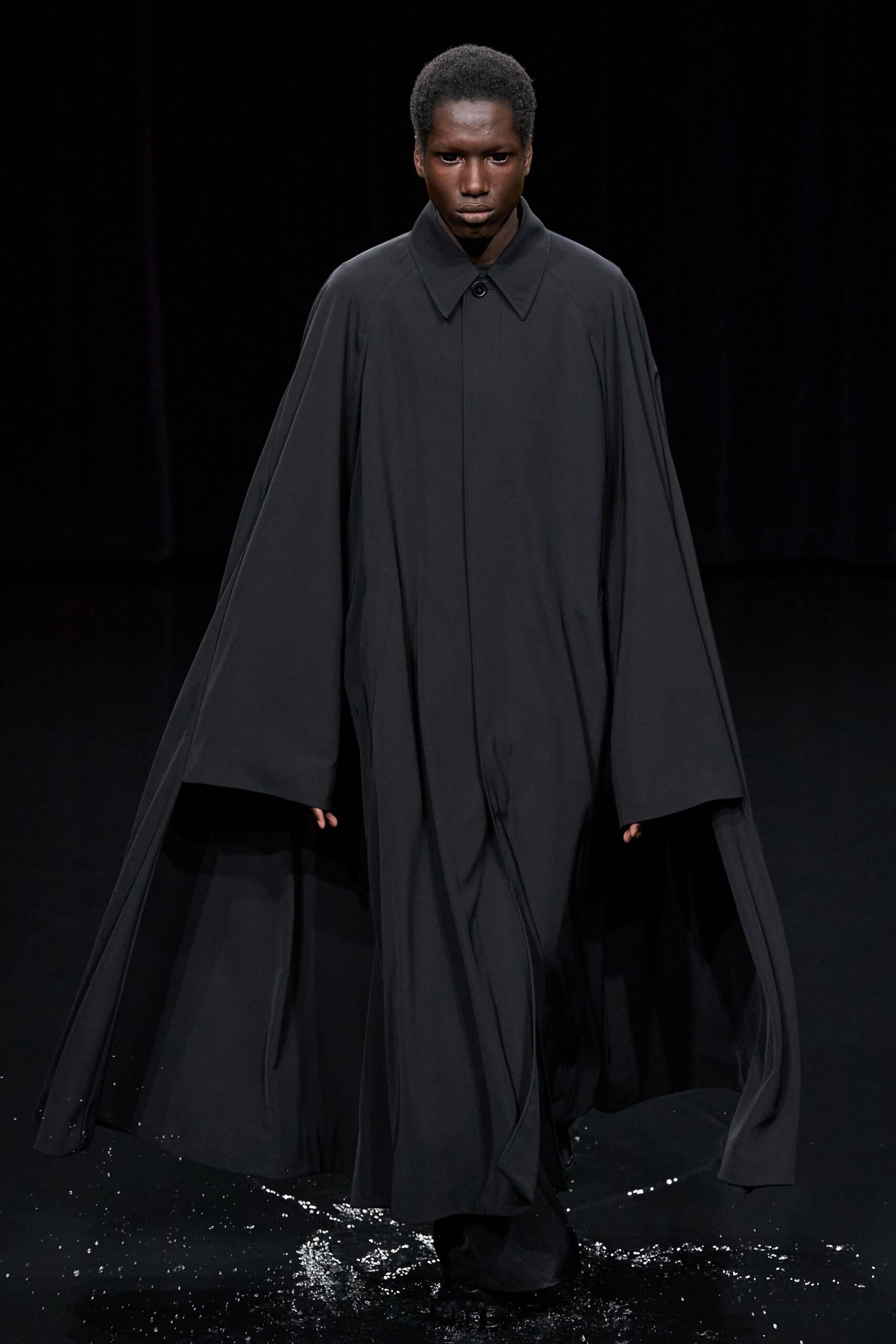black cotton long-sleeve collared relaxed flowing cape