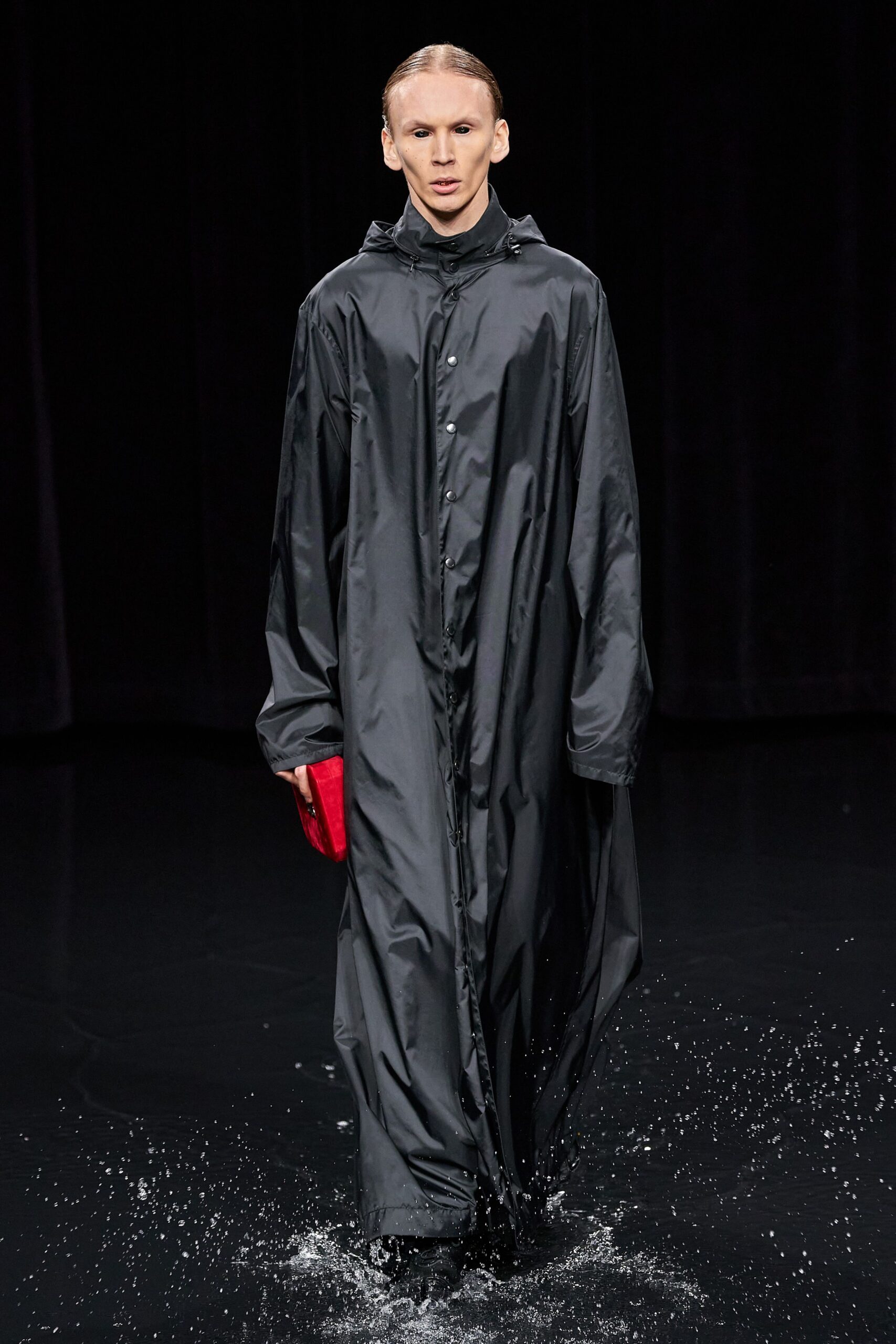 black vinyl long-sleeve collared relaxed zippered shiny coat