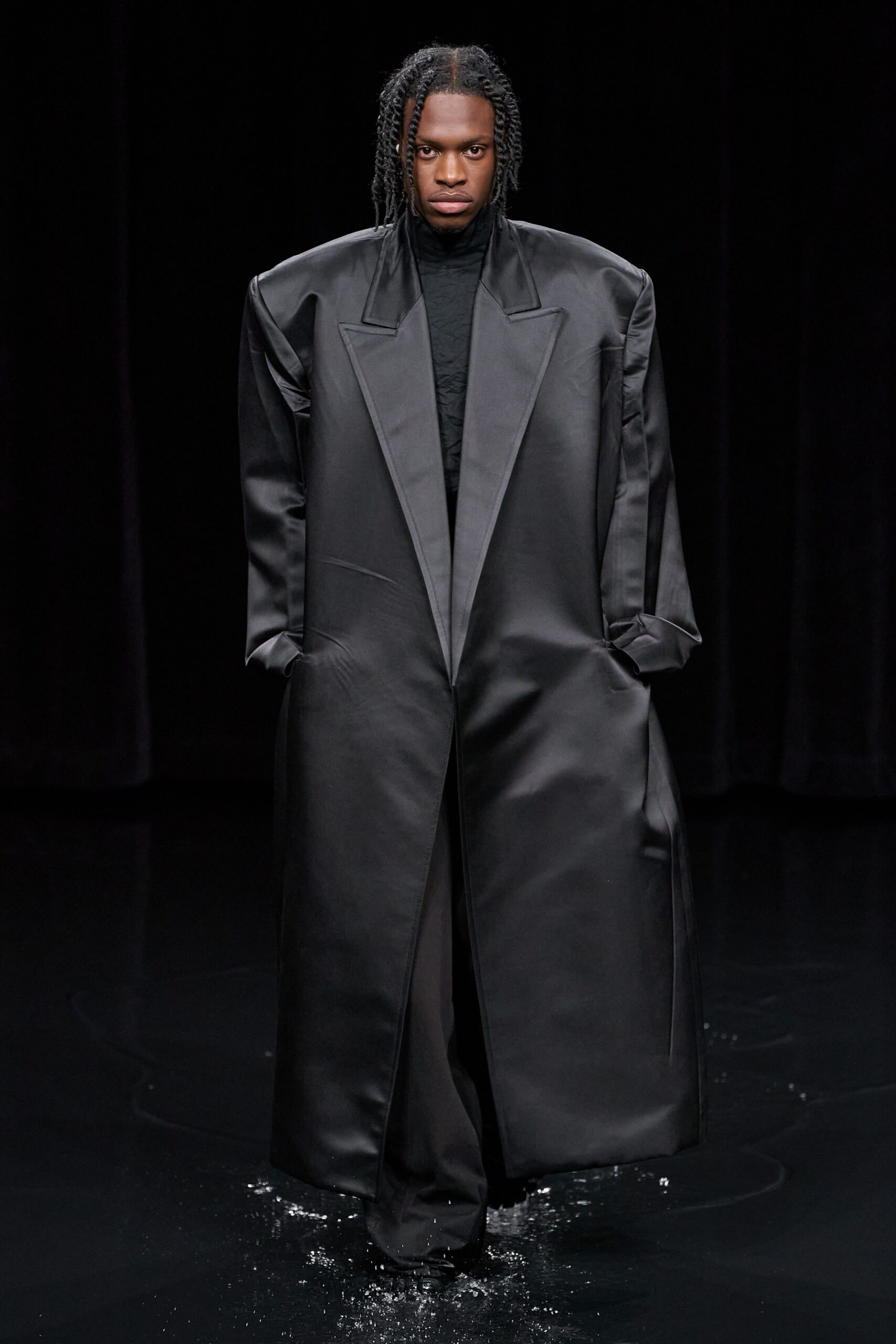black leather long-sleeve collared oversized zippered coat