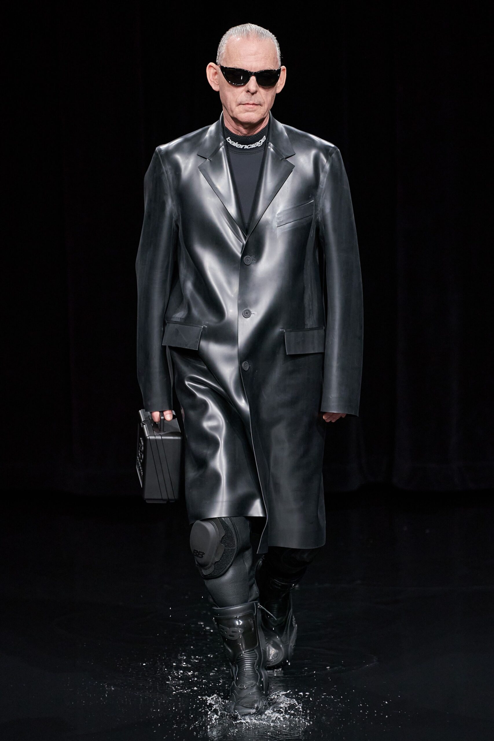 black vinyl long-sleeve collared structured buttoned midi coat