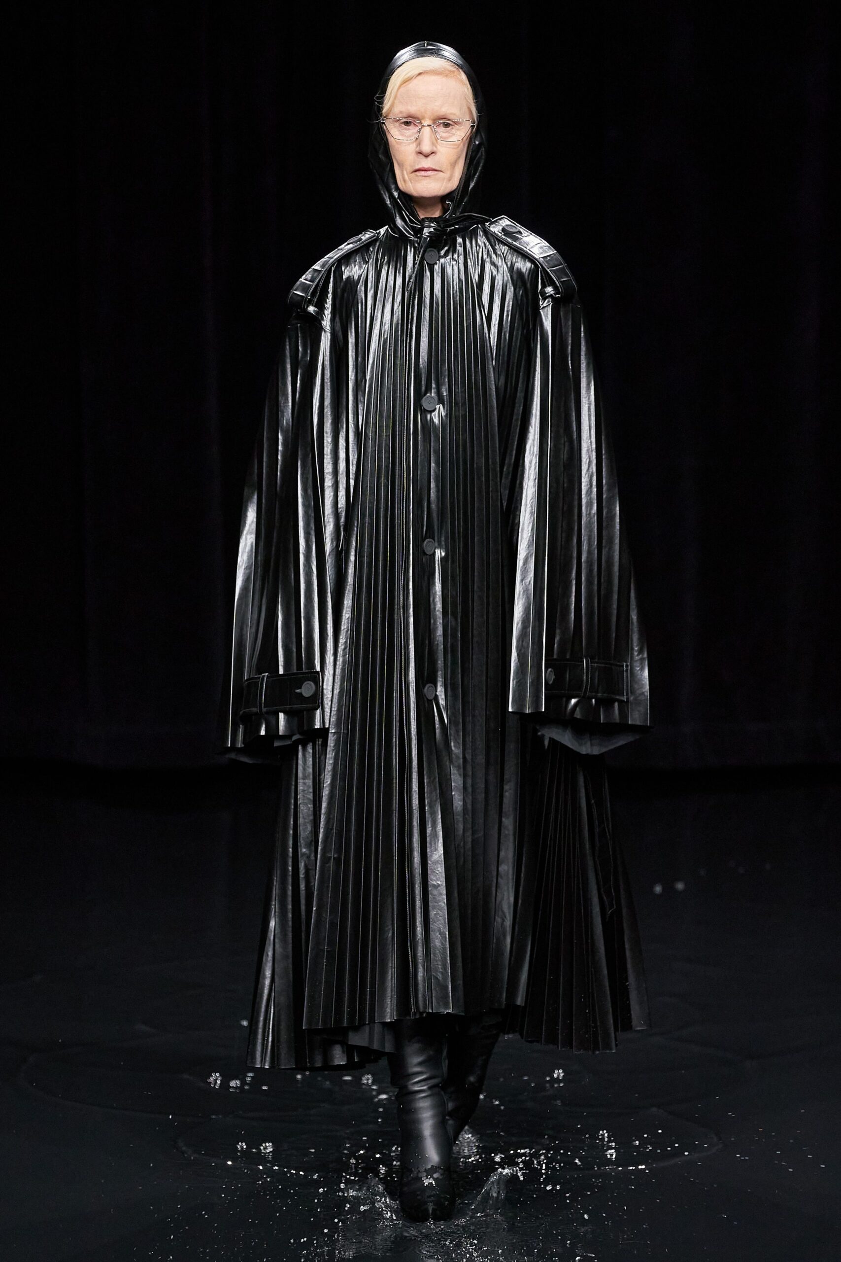black leather long-sleeve collared fitted pleated shiny coat