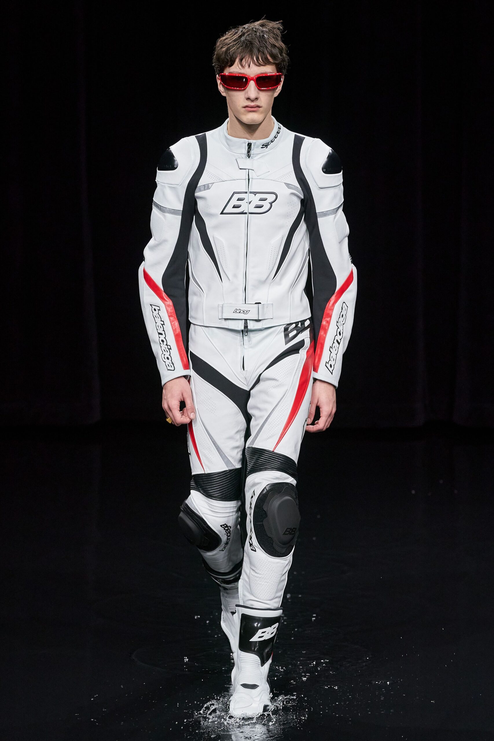 white leather long-sleeve collared fitted zippered color-blocked catsuit