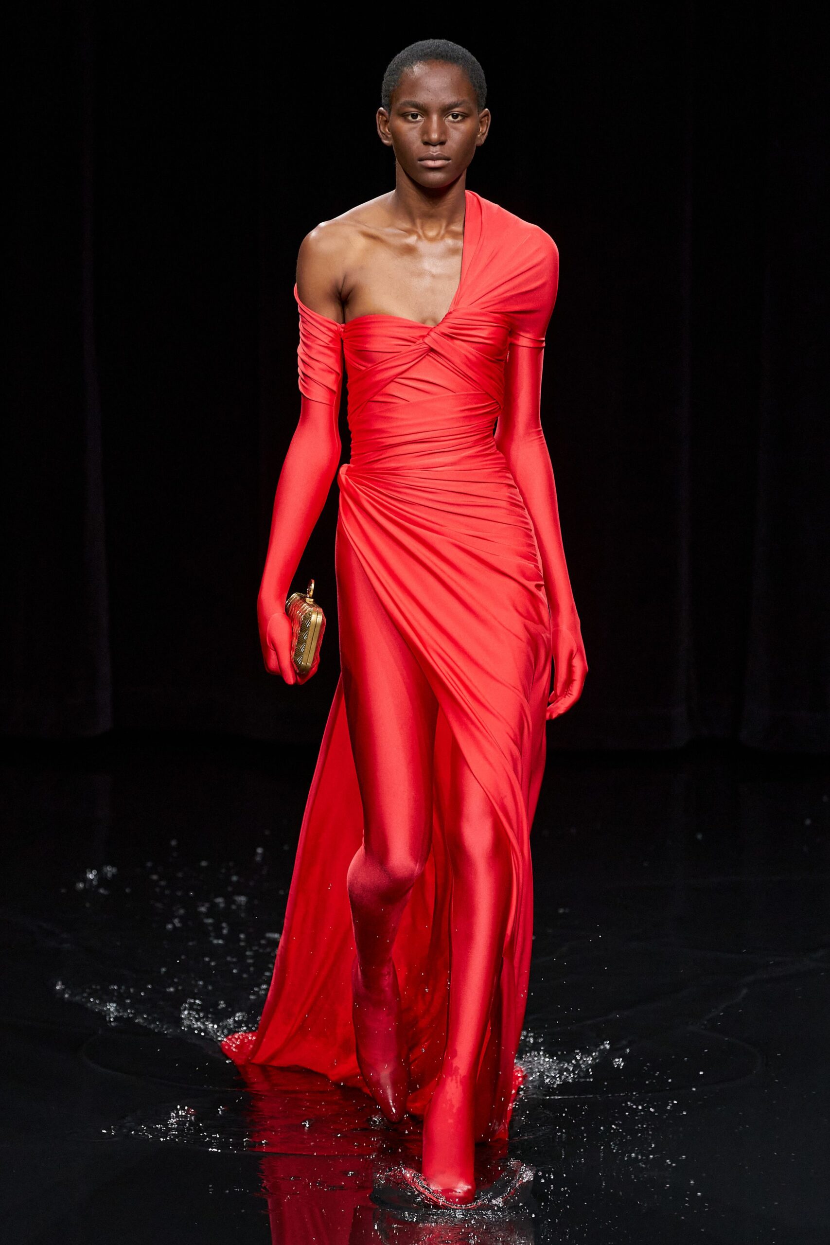 red silk sleeveless off-shoulder fitted ruched draped gown