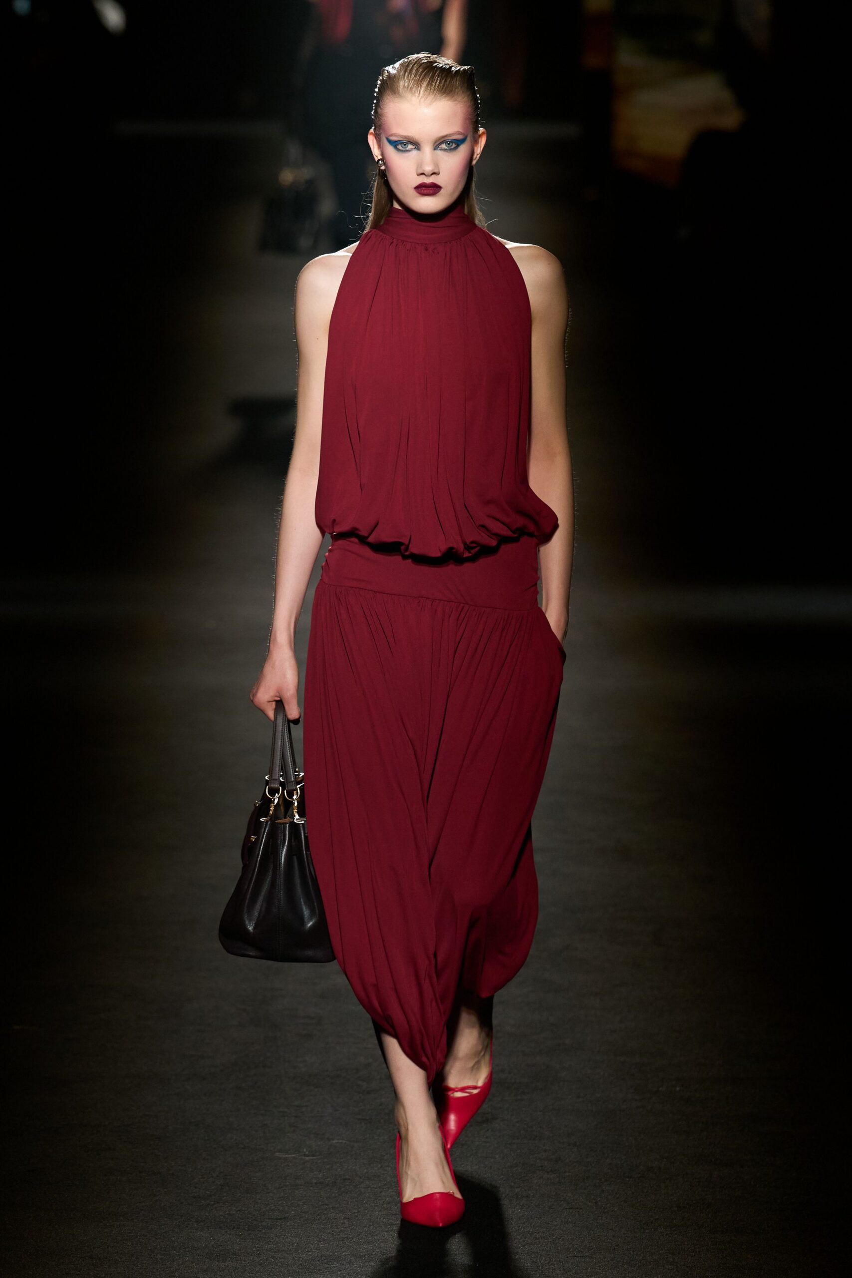 red silk sleeveless halter relaxed draped jumpsuit