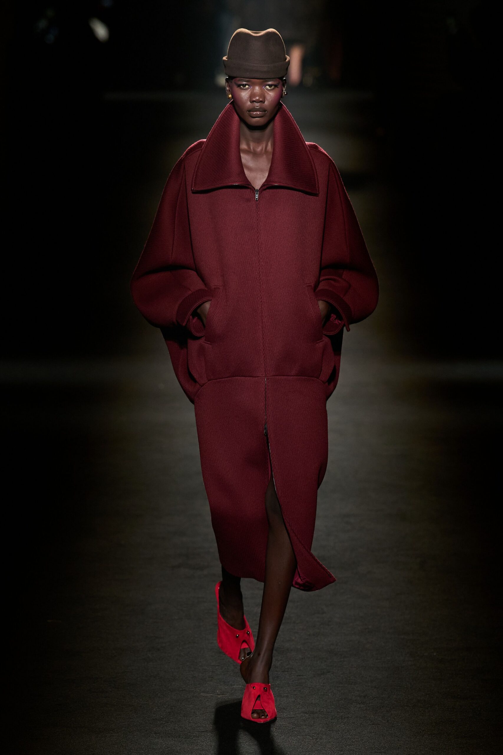 red wool long-sleeve collared oversized zippered maxi coat