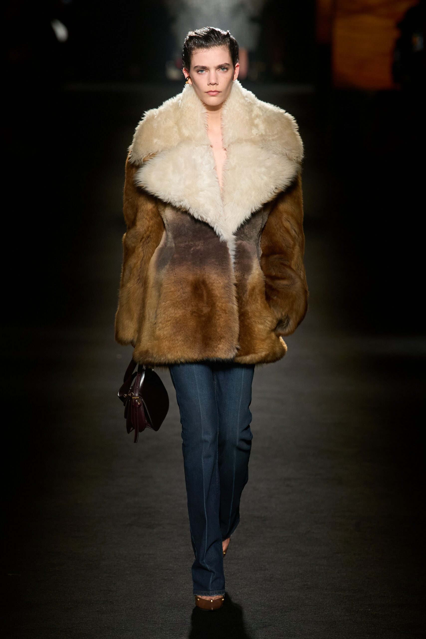 brown fur coat with denim pants