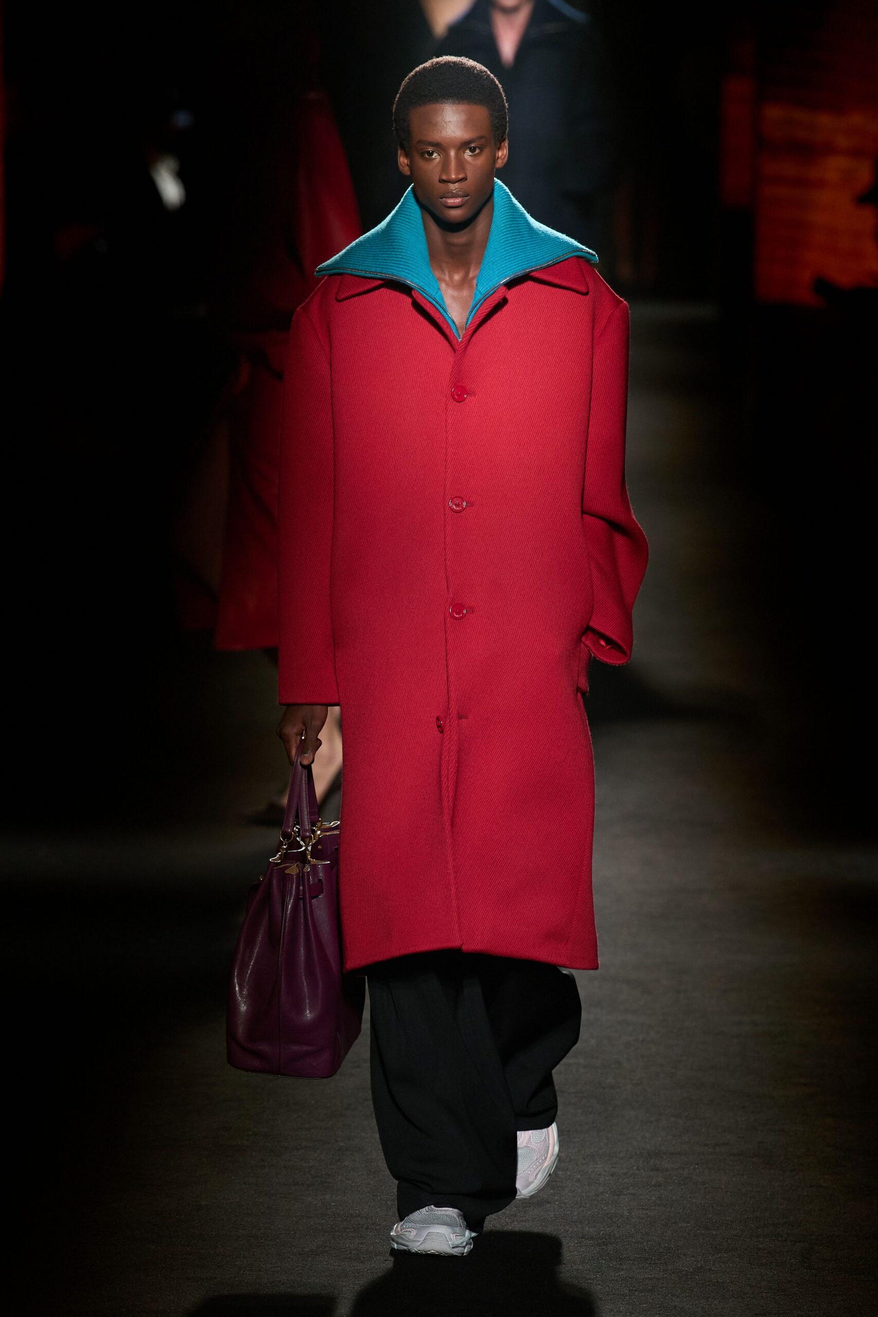 red wool coat with purple bag