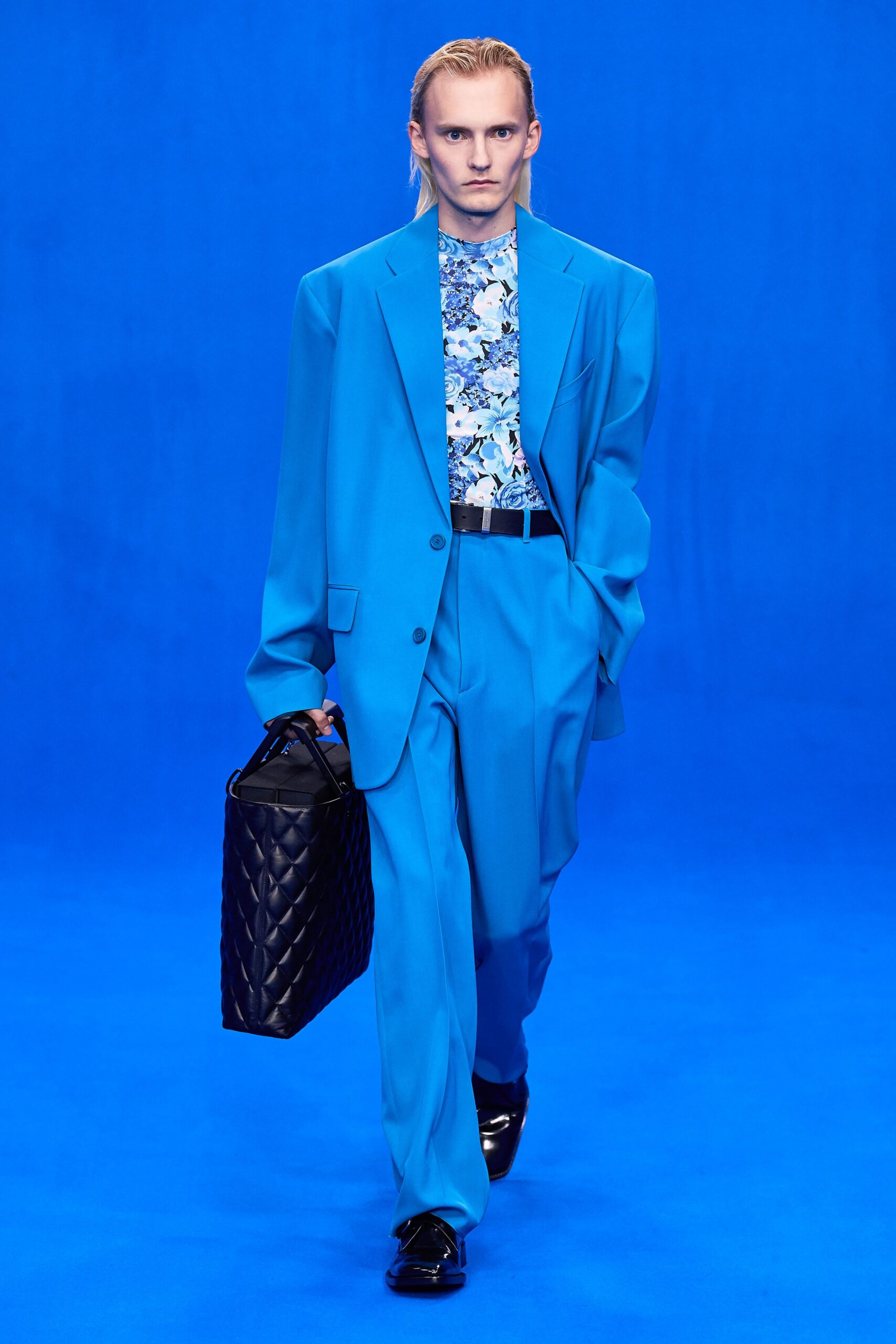 blue tailored suit with floral shirt