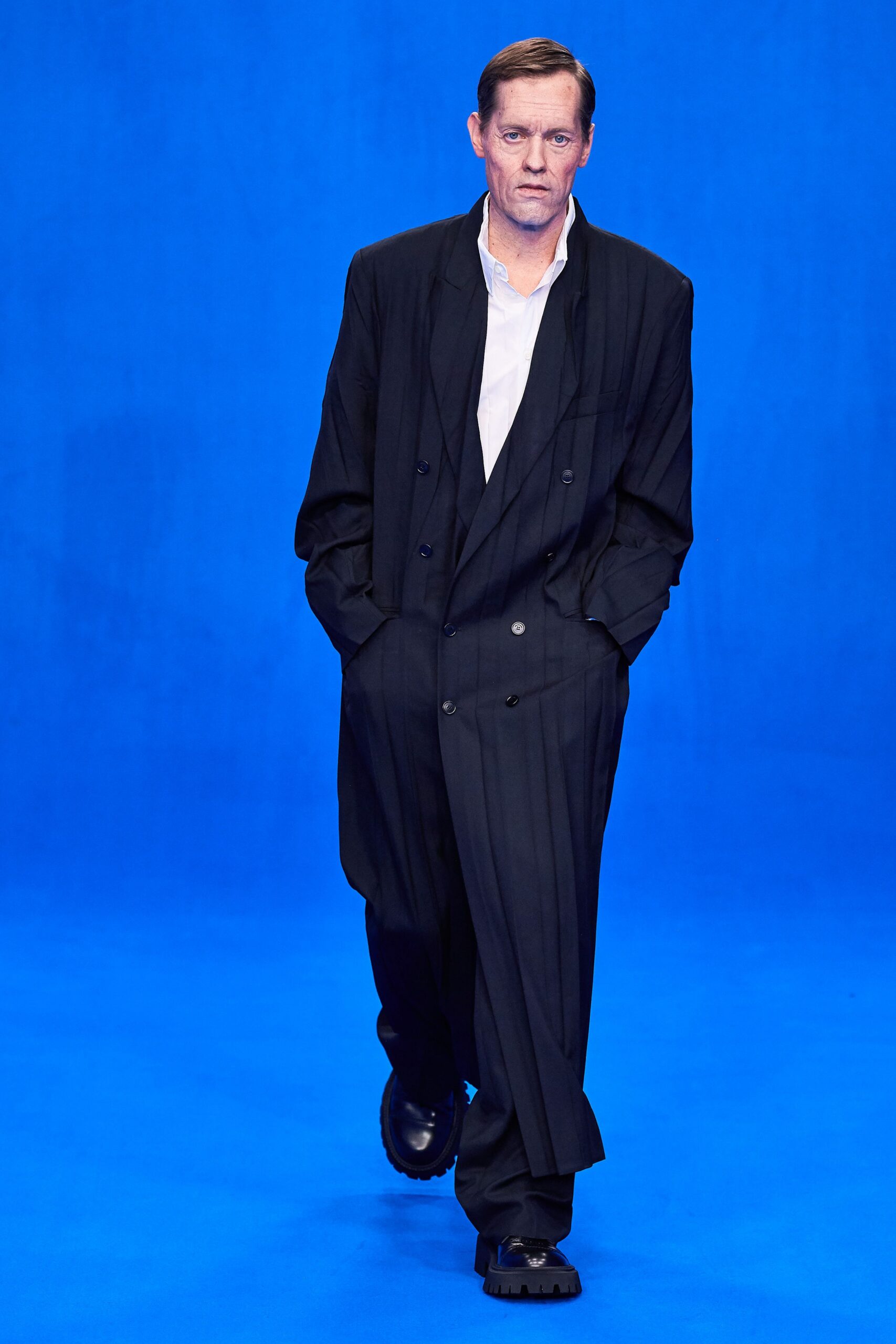 black relaxed suit with white shirt