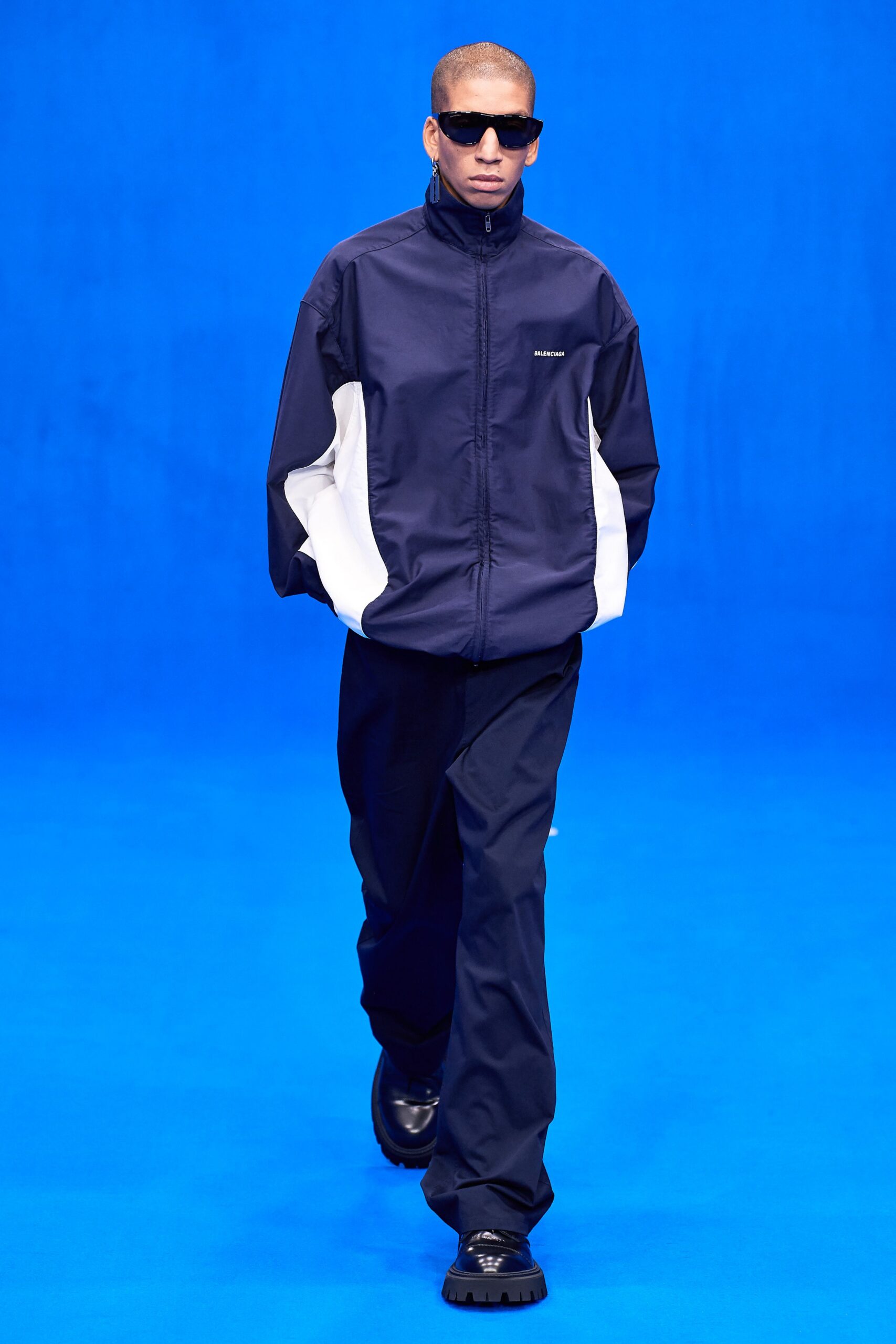 navy and white relaxed jacket with black pants