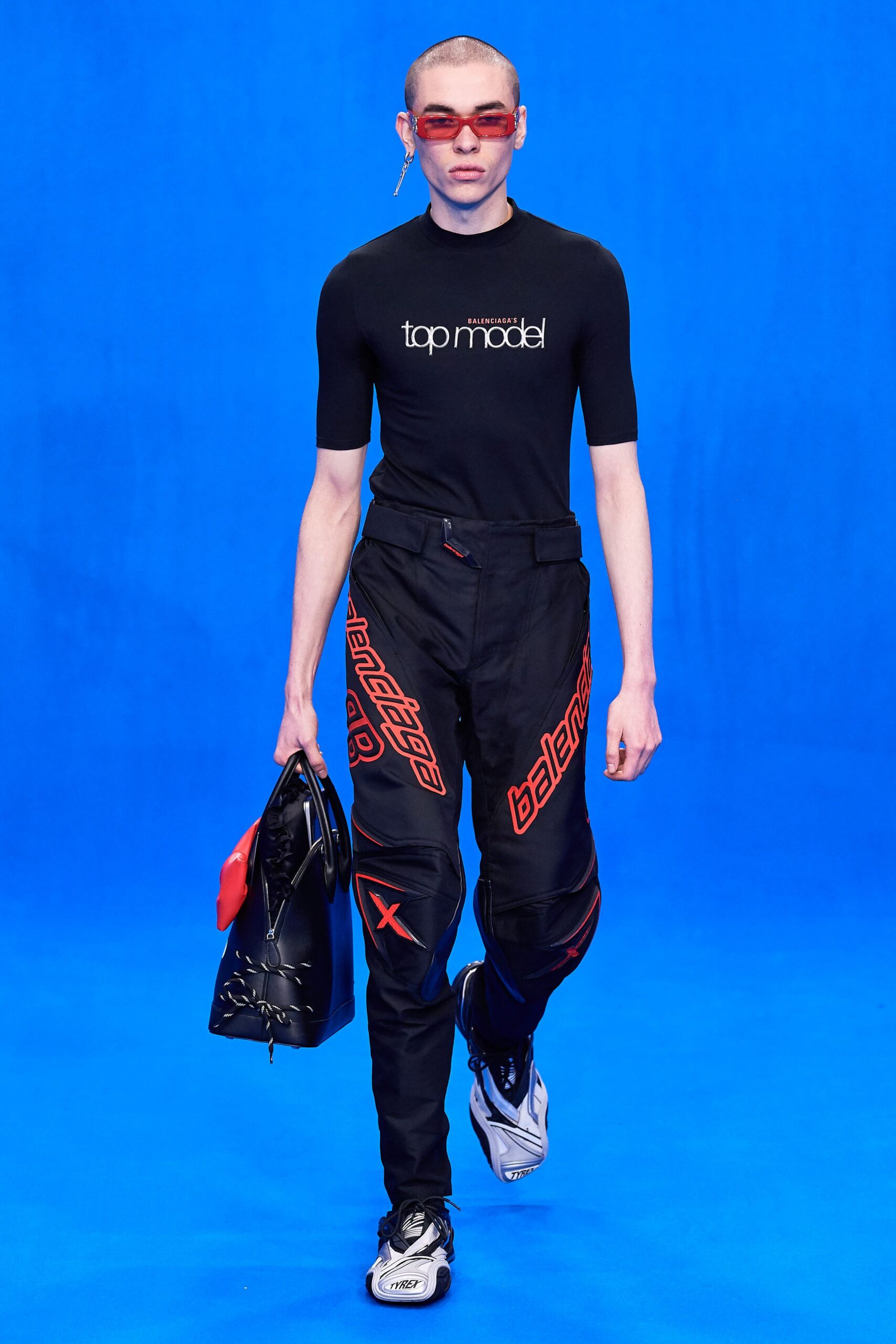 black fitted top with cargo pants