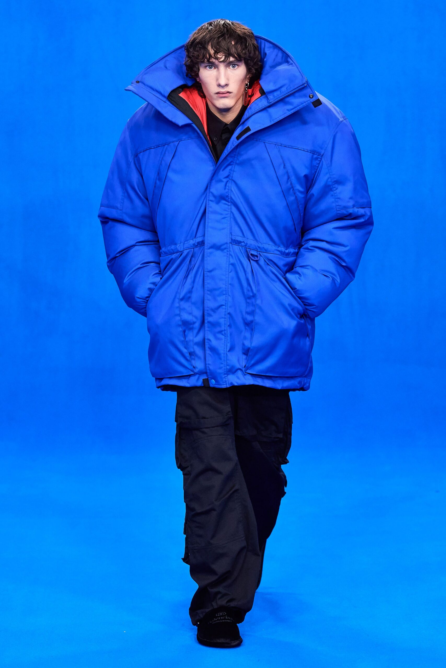 blue oversized parka with cargo pants