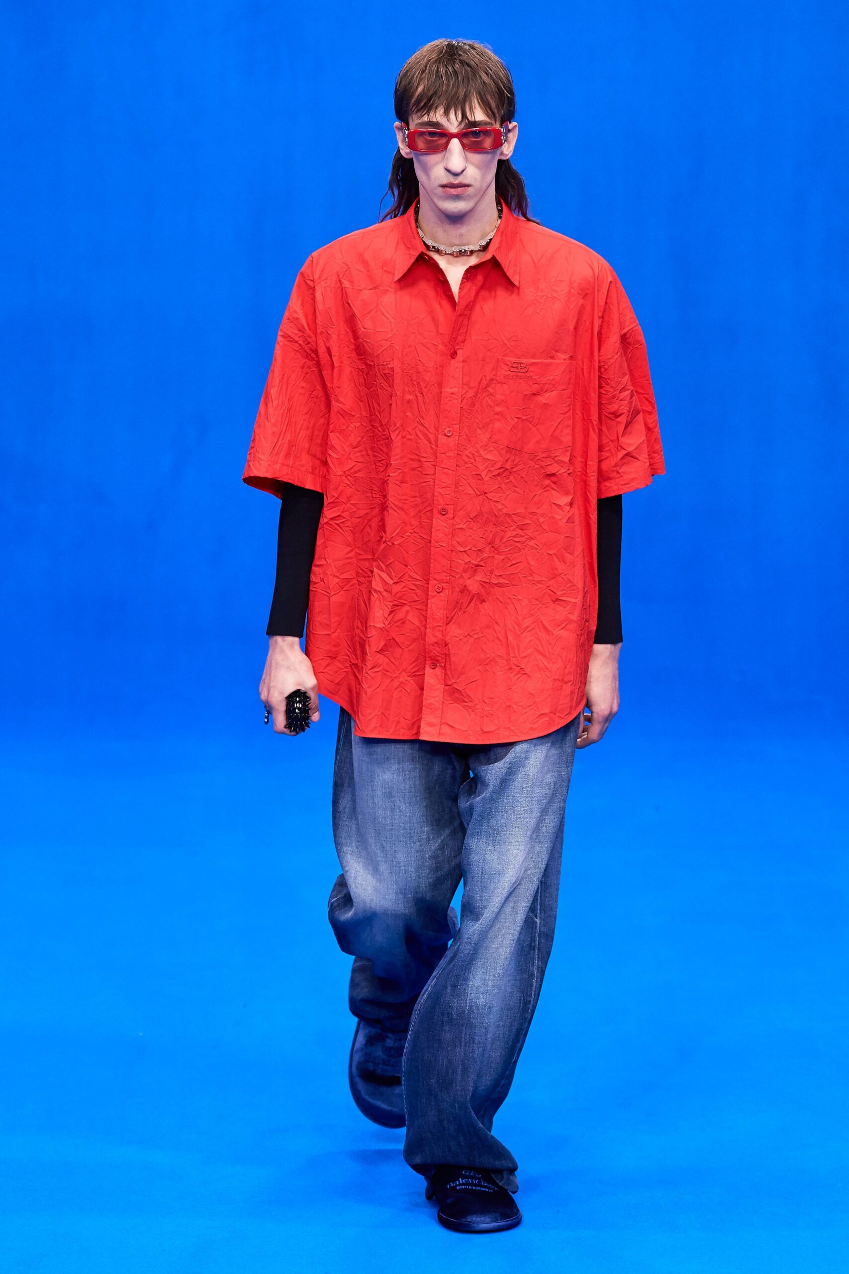 red relaxed shirt with denim pants