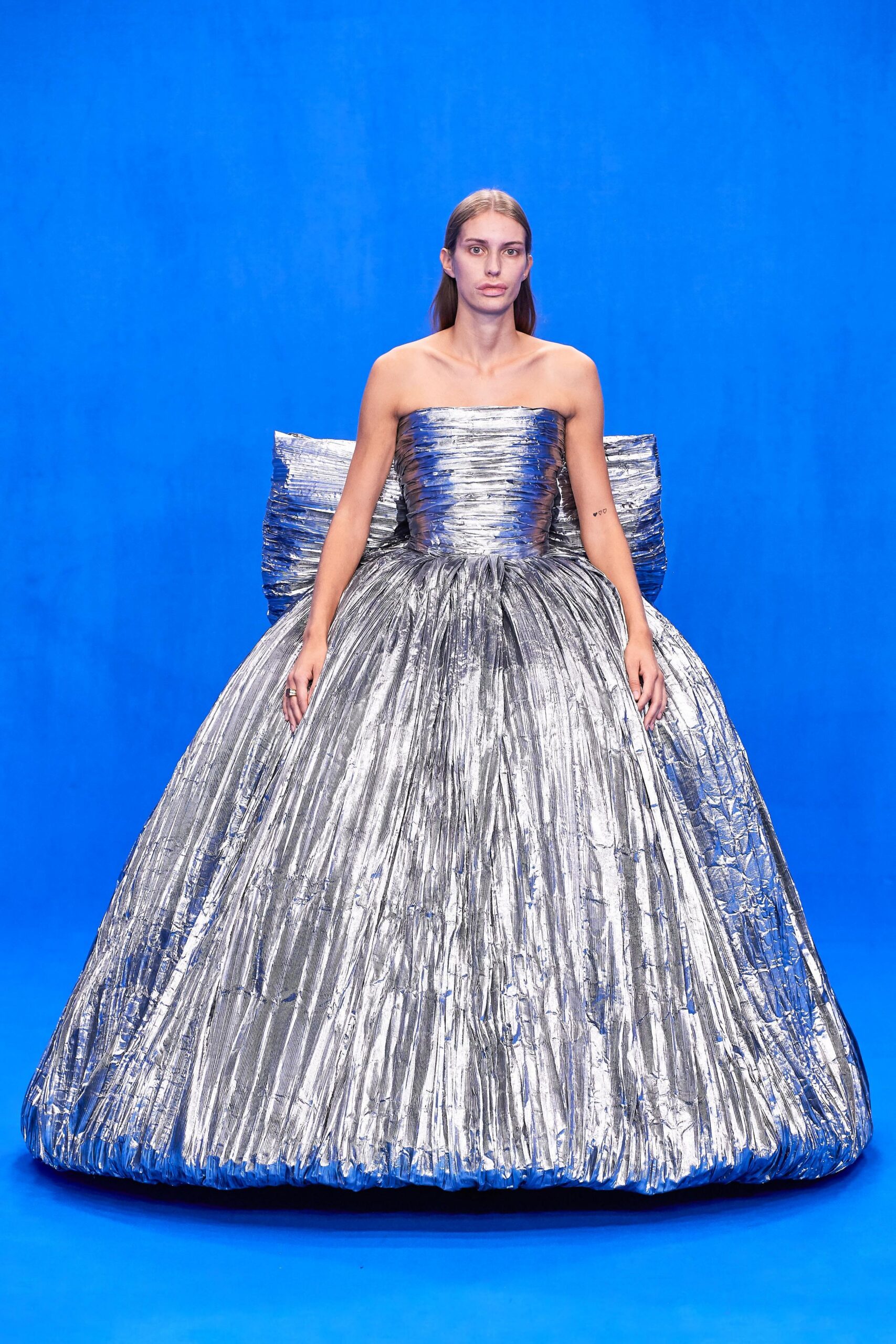 silver pleated strapless gown
