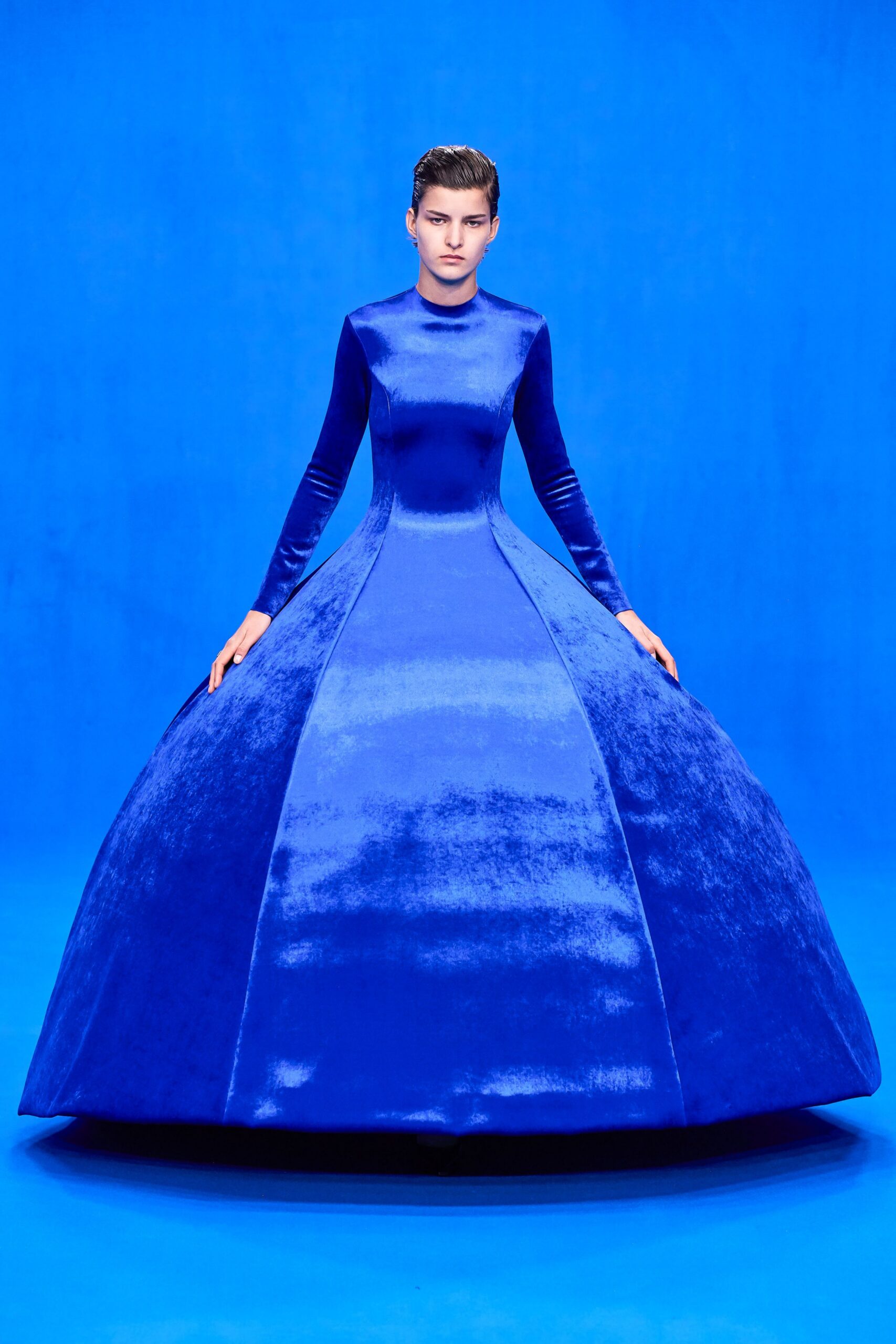 blue velvet long-sleeve gown
