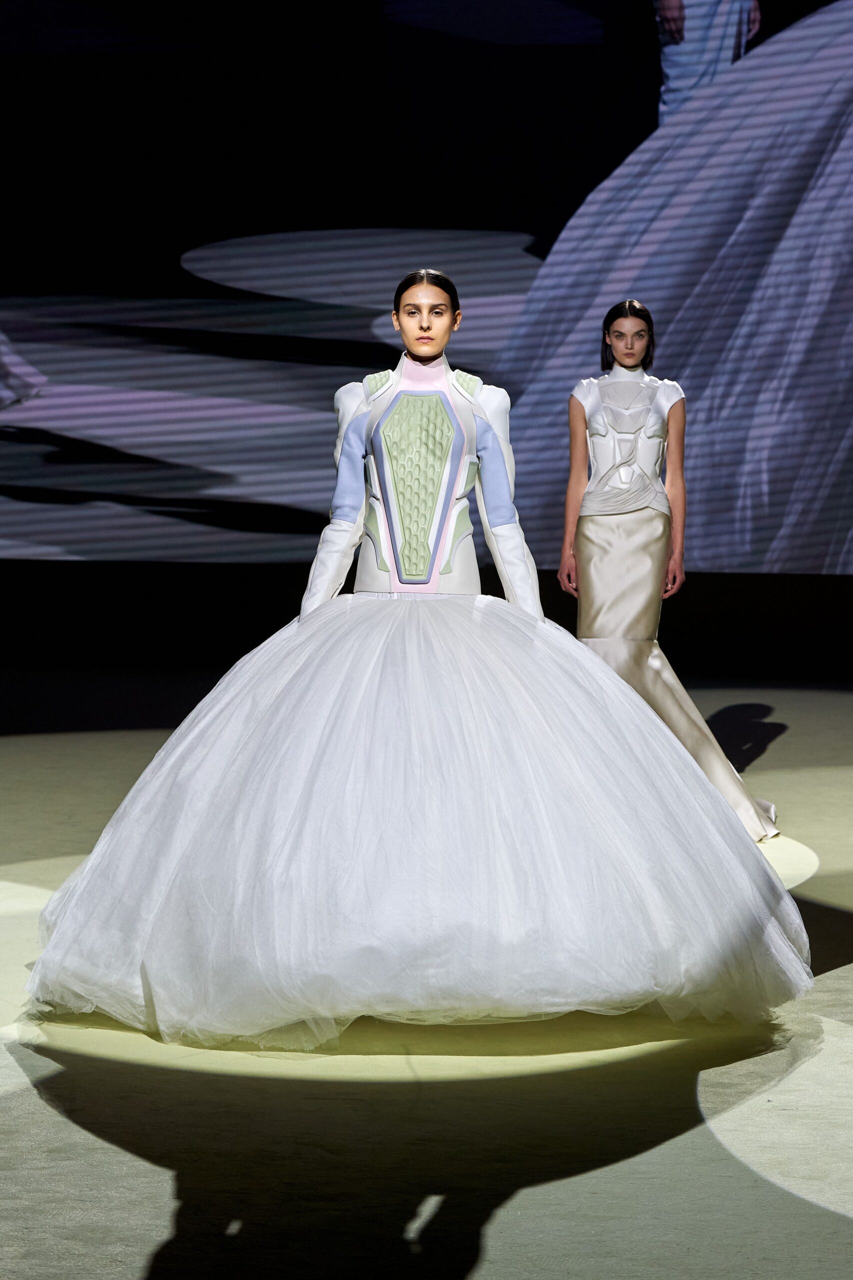 white tulle sleeveless high-neck fitted layered pleated gown