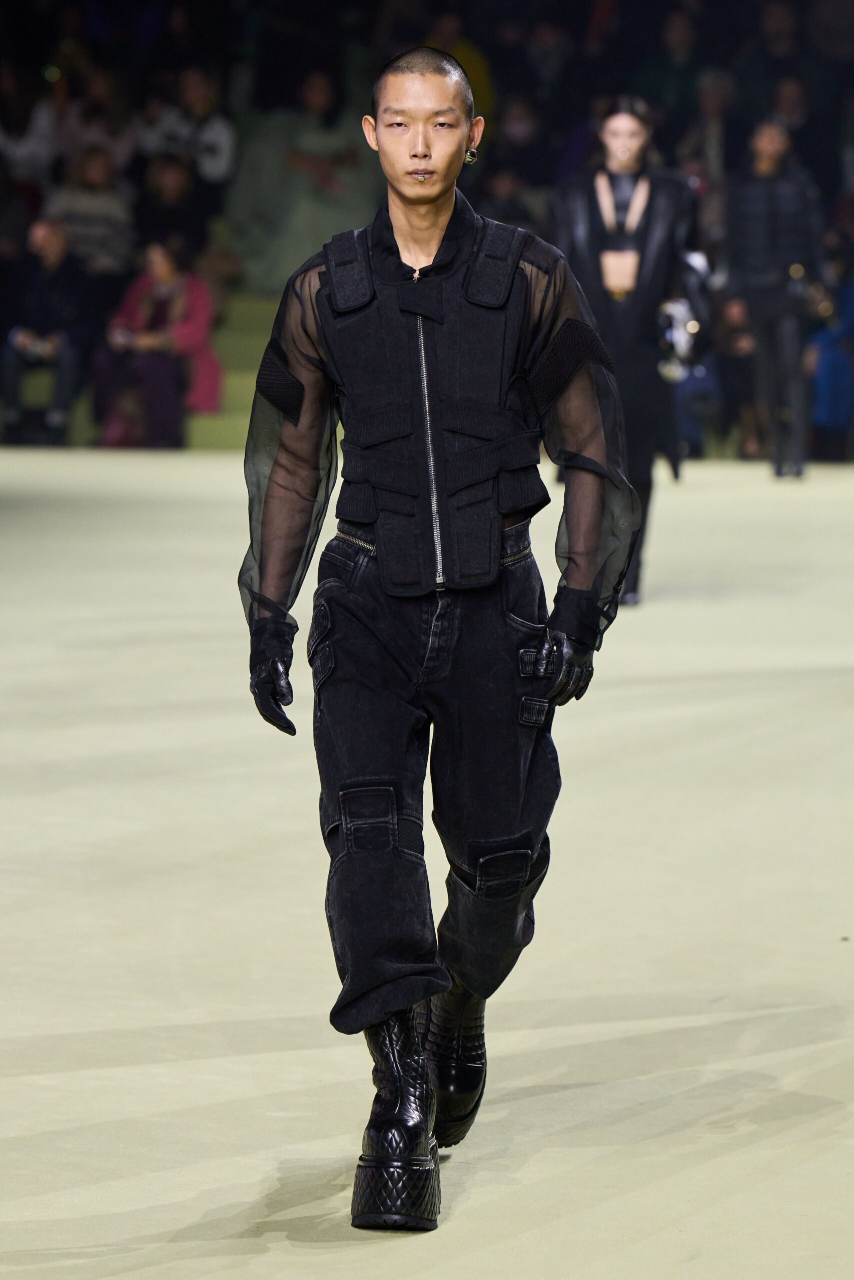 black fitted jacket and relaxed pants