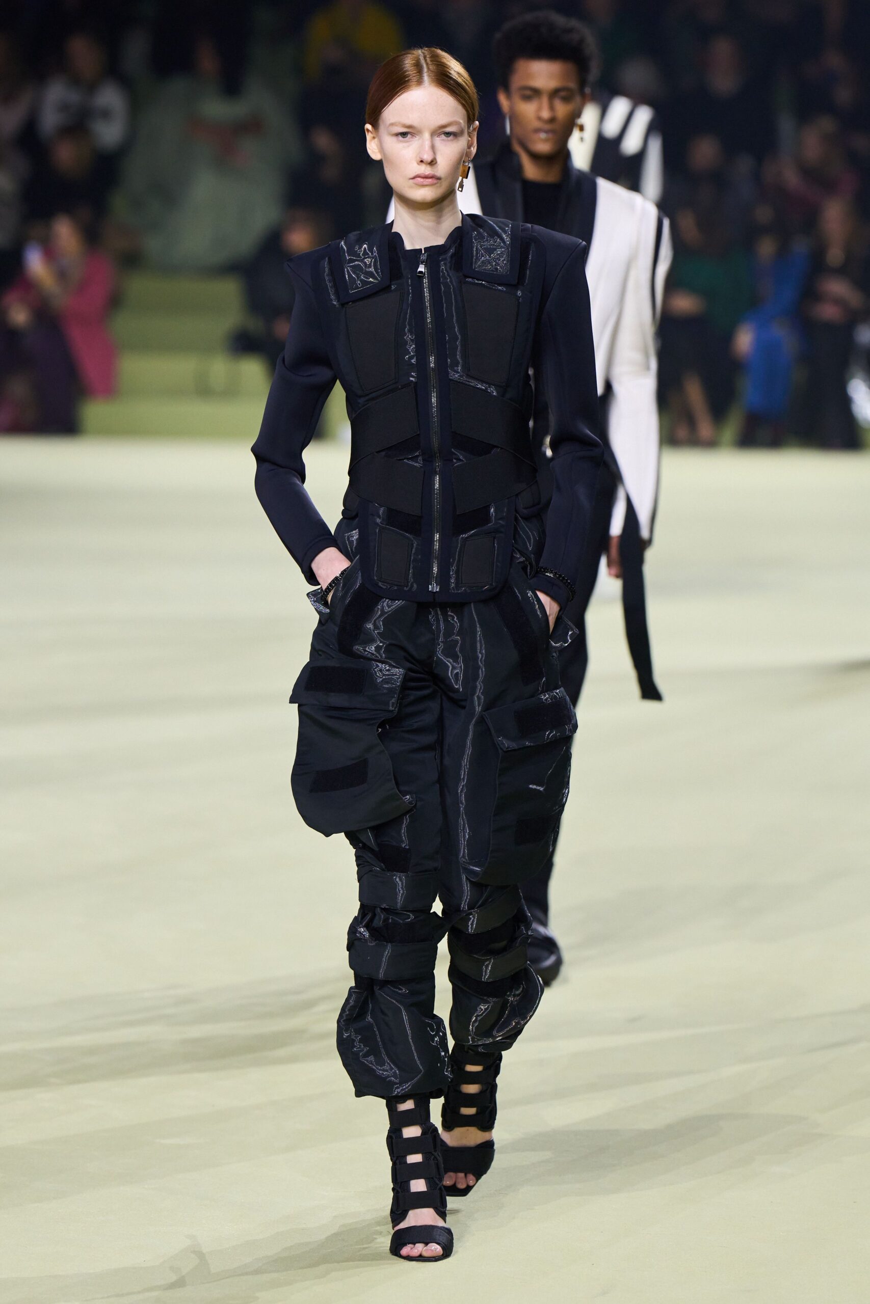 black fitted jacket and relaxed pants