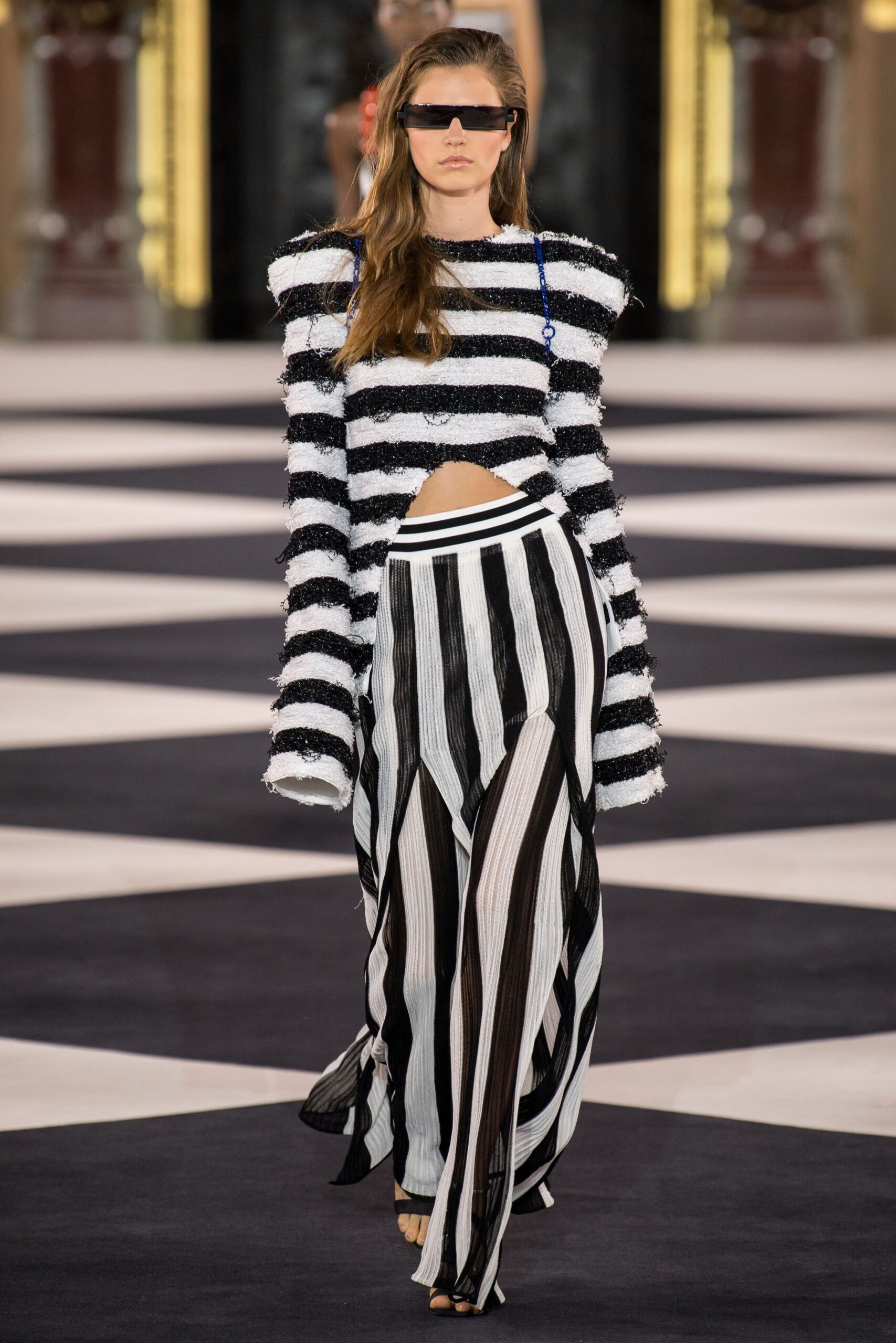striped top and pleated skirt