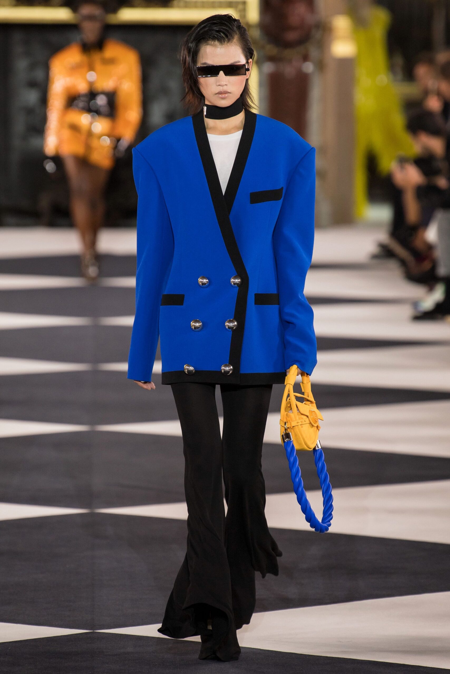 blue tailored blazer with black pants