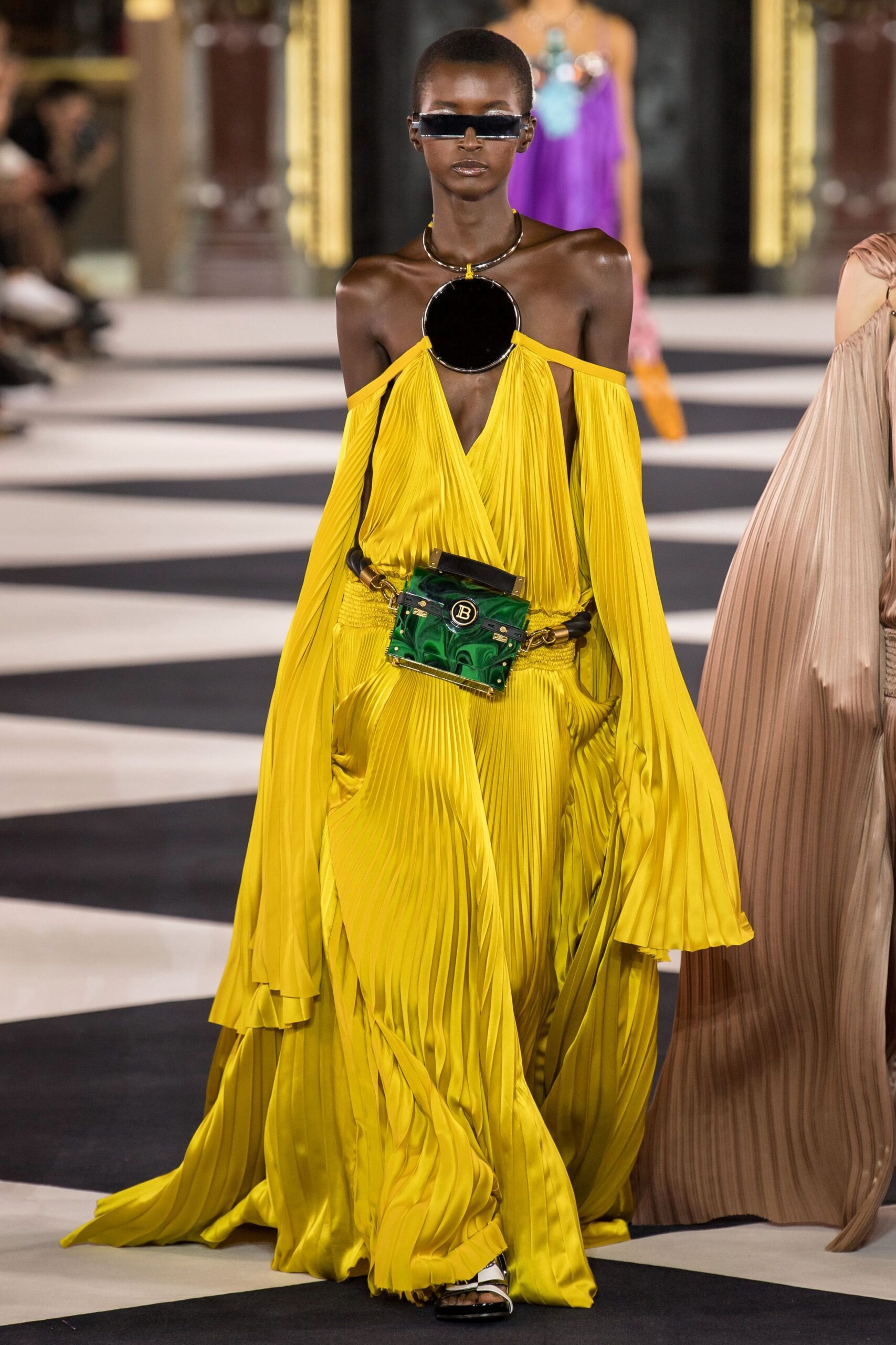 yellow silk sleeveless off-shoulder relaxed pleated draped gown