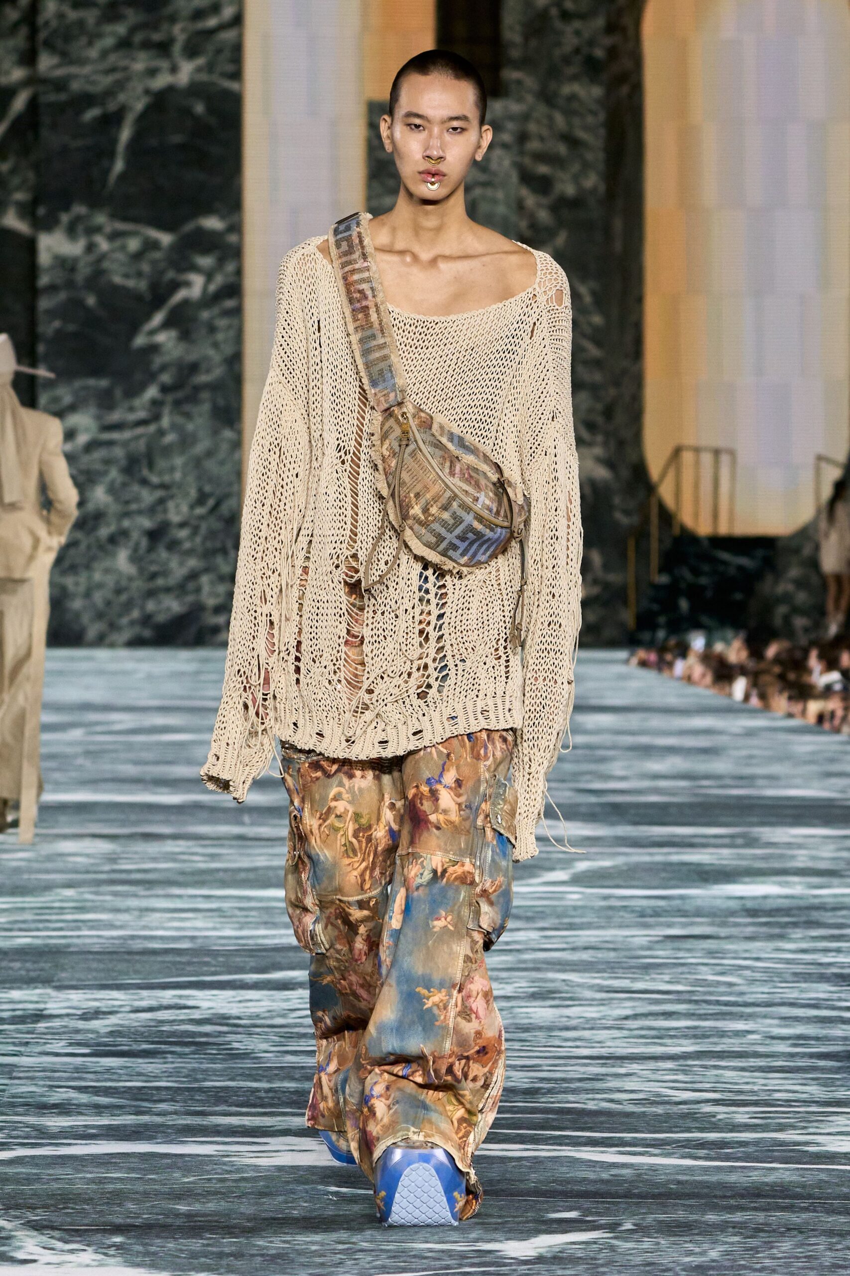 beige relaxed sweater with multi pants