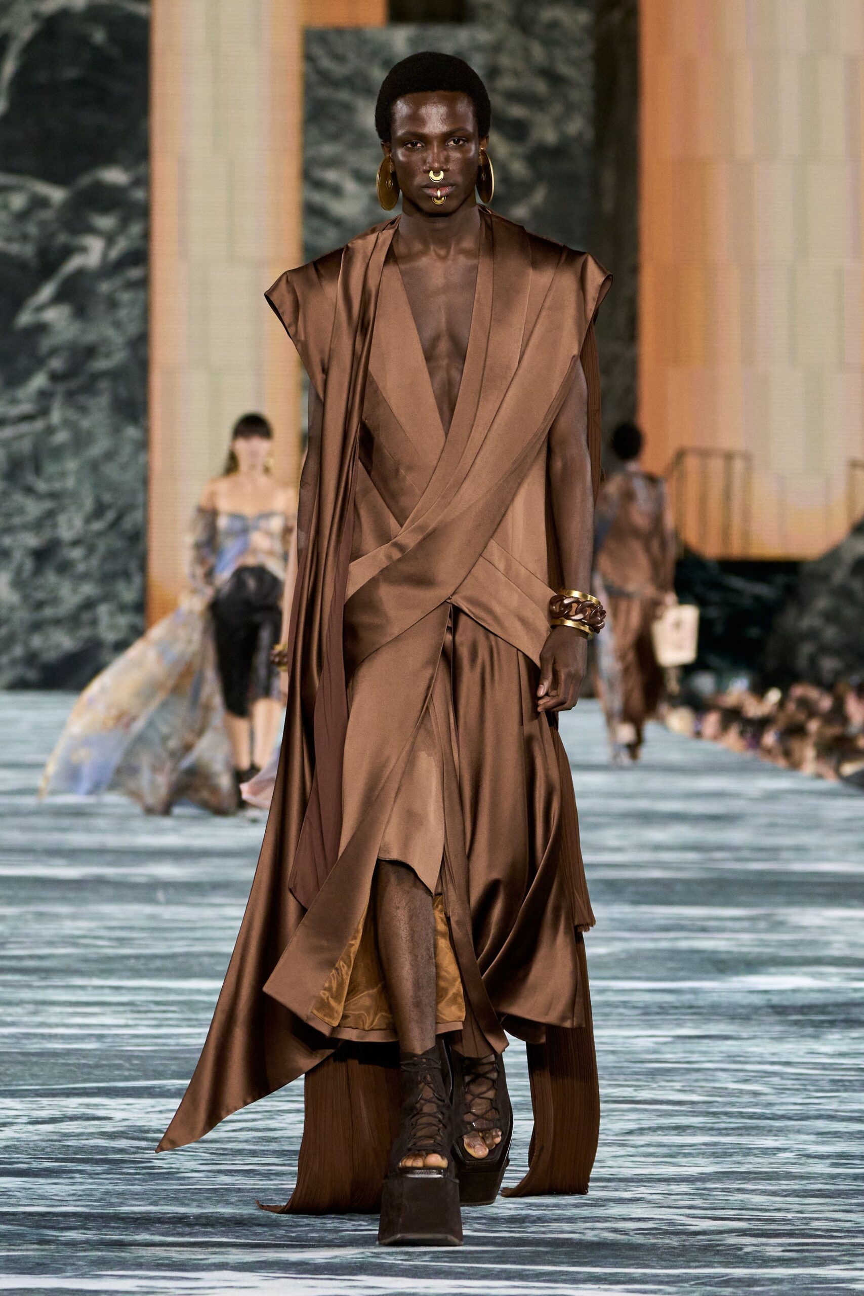 brown silk sleeveless v-neck fitted draped tiered gown