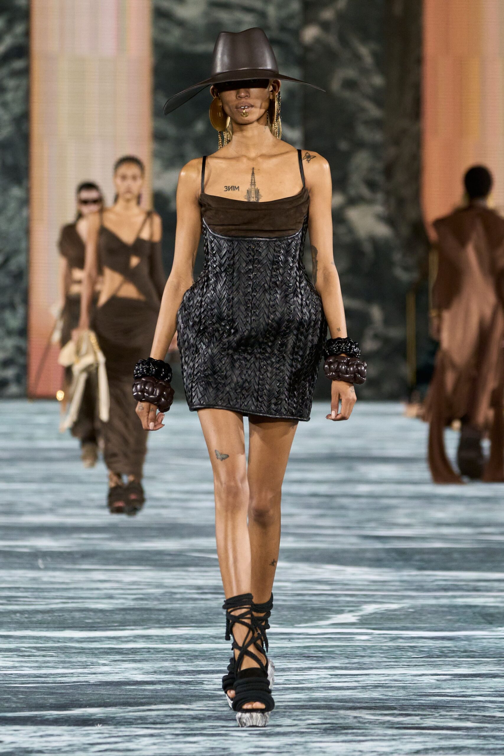 black leather sleeveless v-neck fitted pleated mini mini-dress