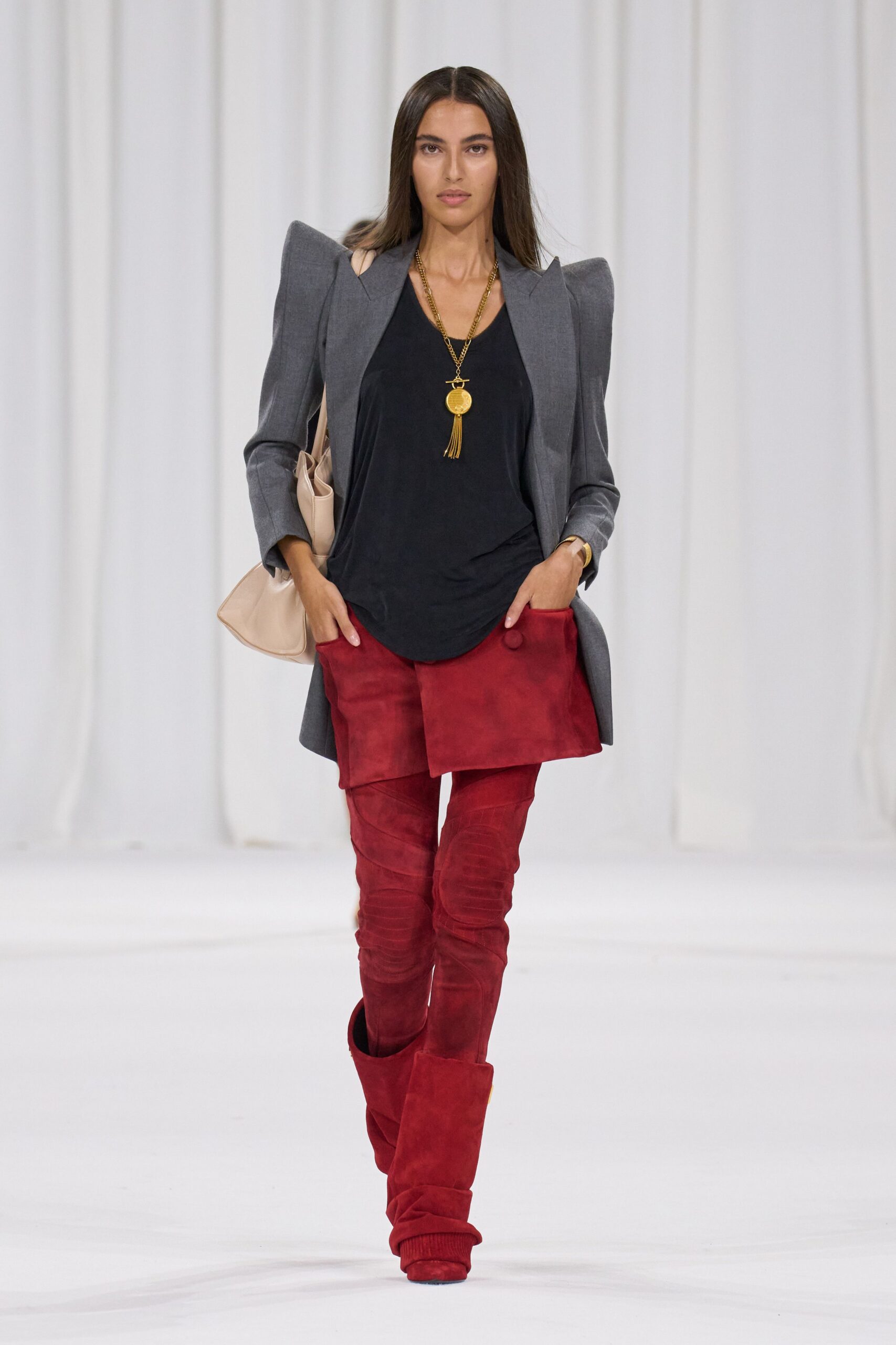 gray blazer black top red pants