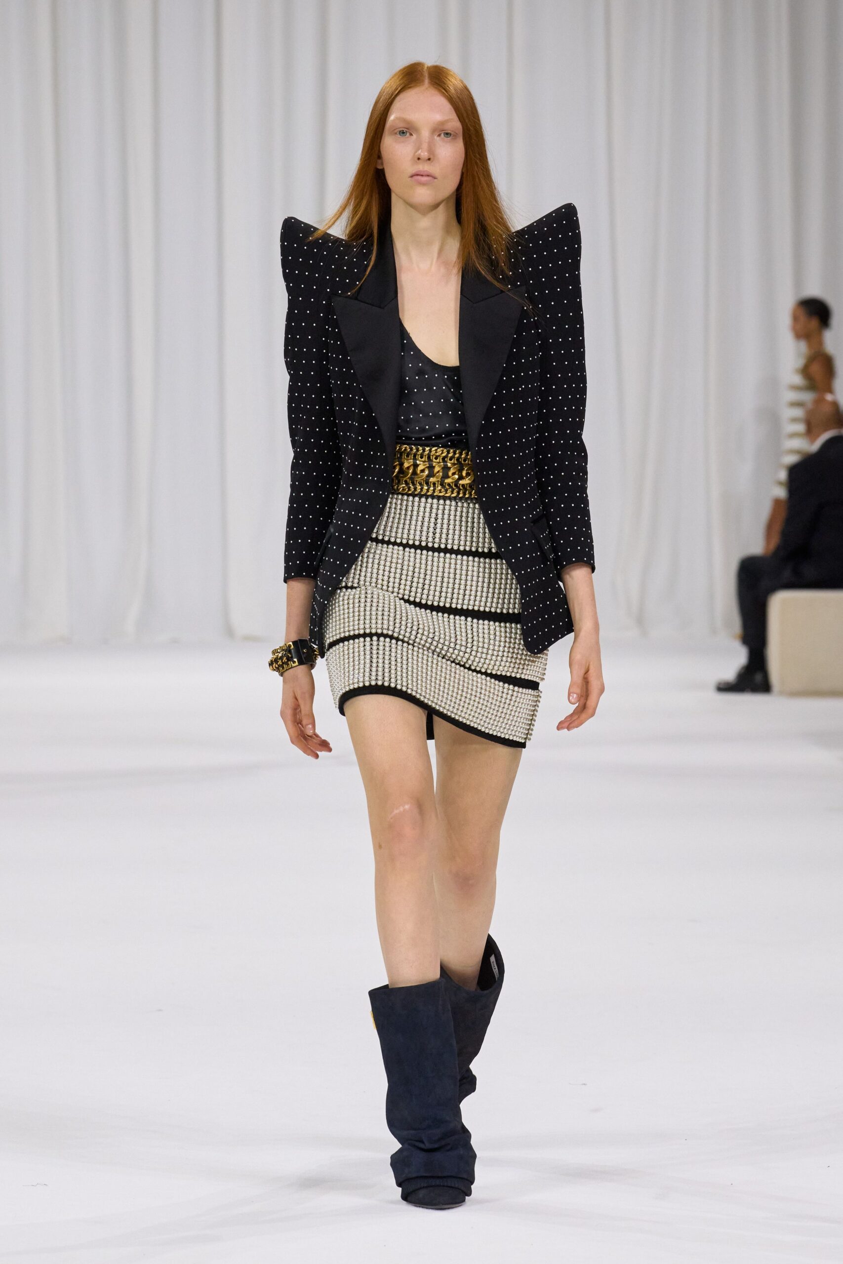 structured black blazer with mini skirt
