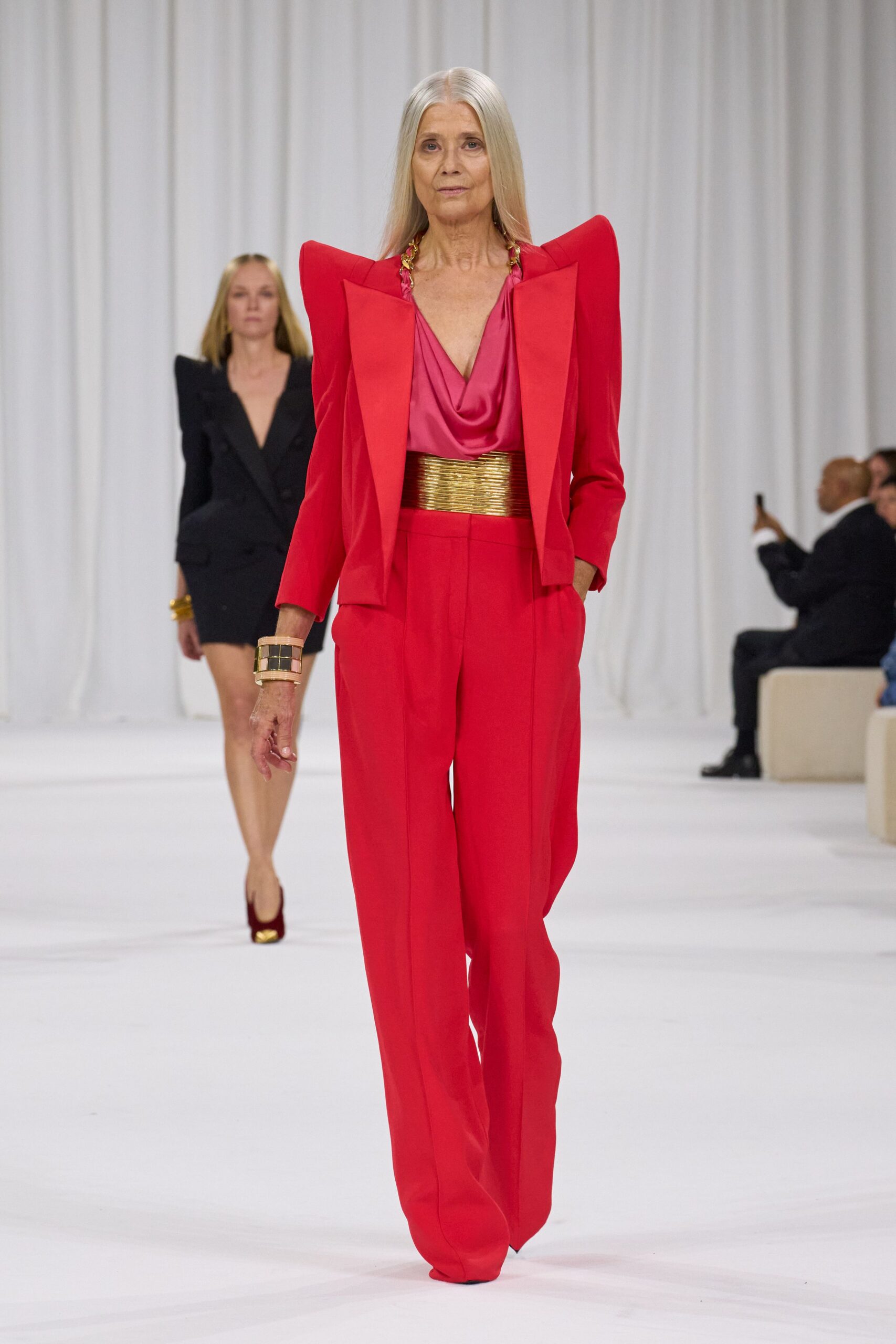 red tailored suit with pink blouse