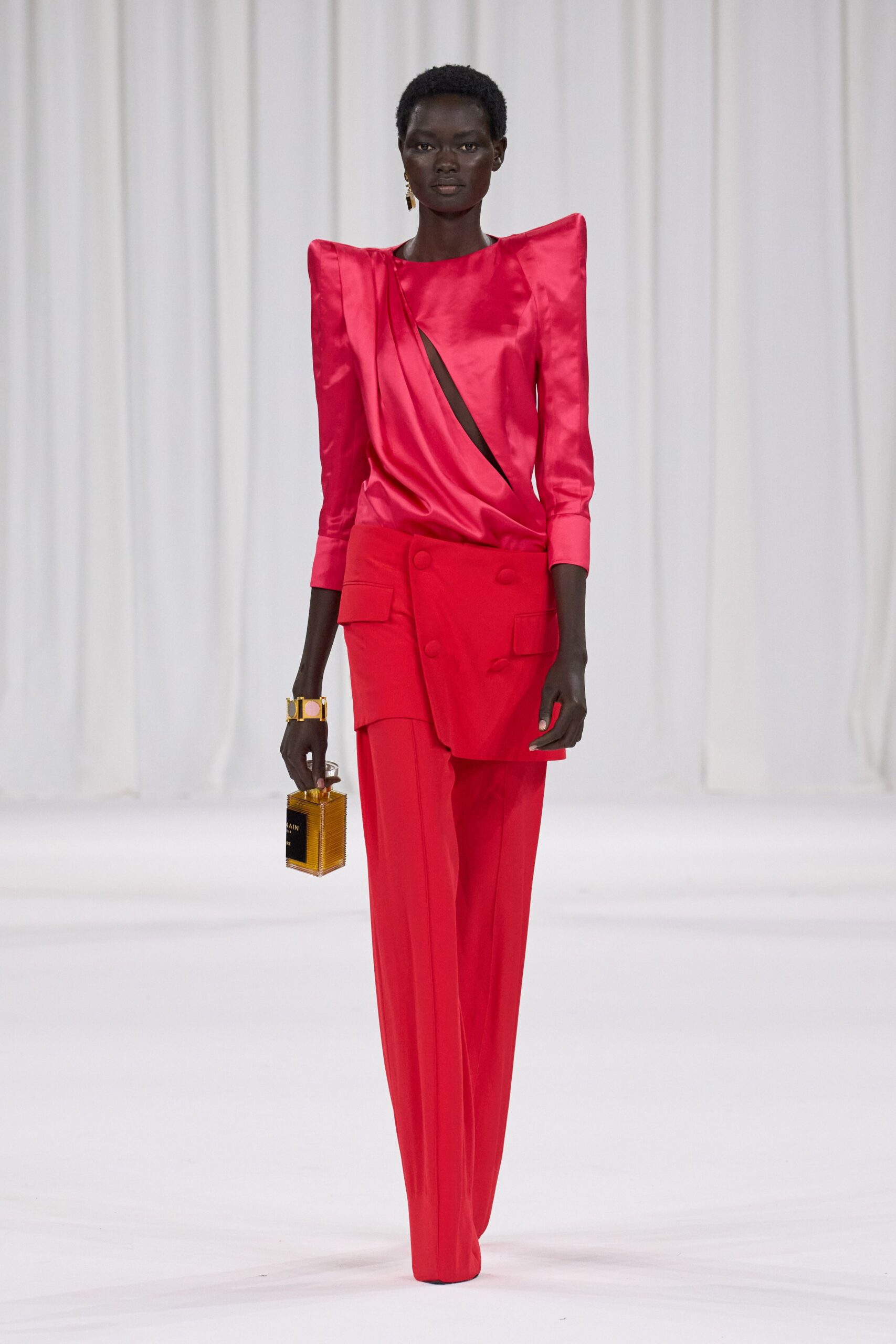 red silk fitted top and pants