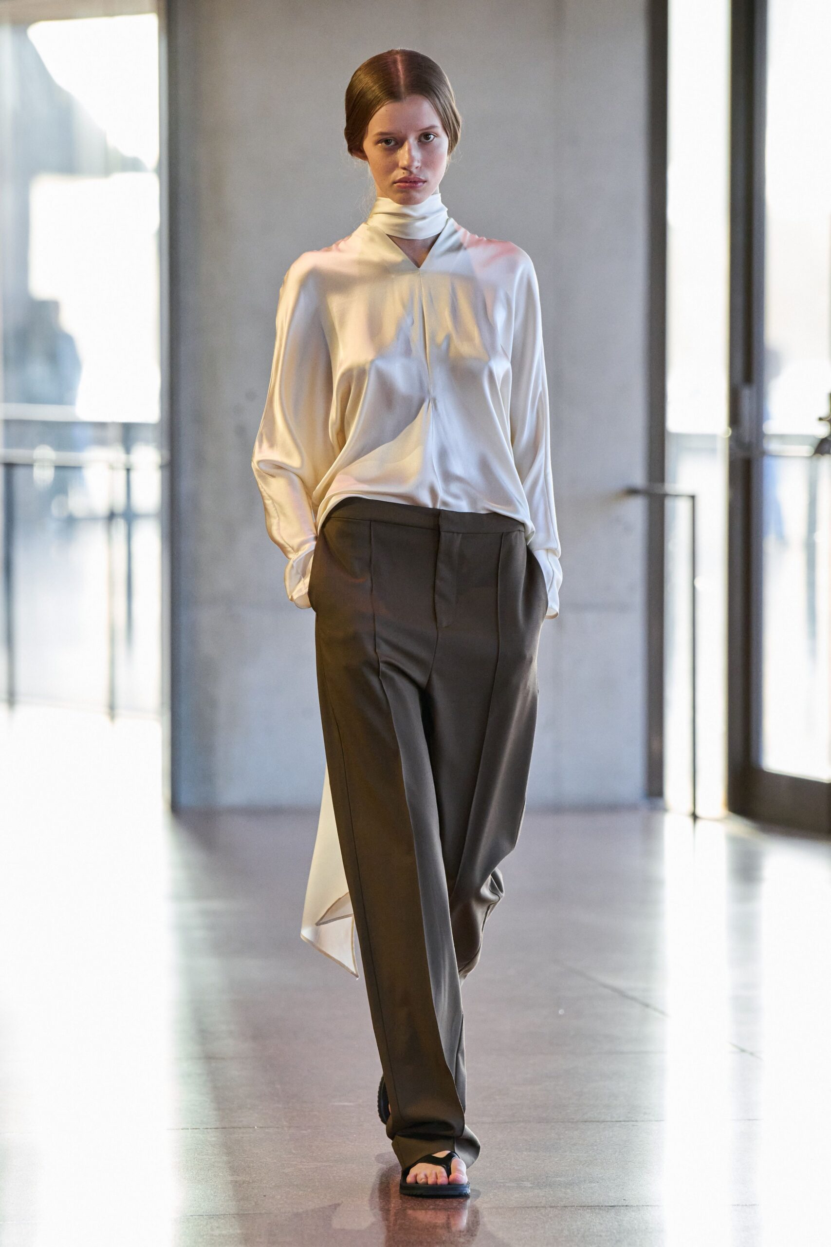white silk long-sleeve high-neck relaxed flowing top