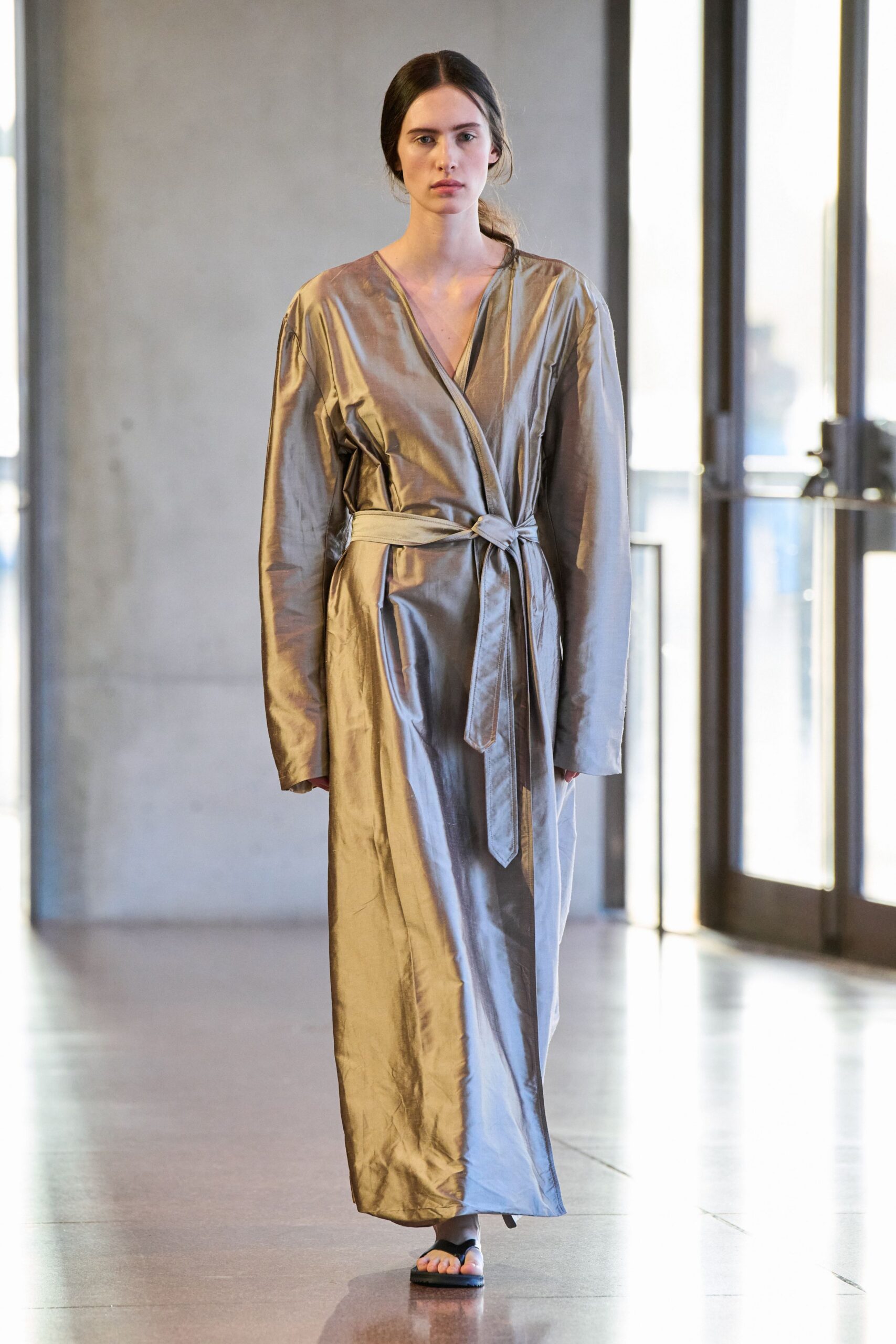gray silk long-sleeve v-neck fitted belted shiny gown