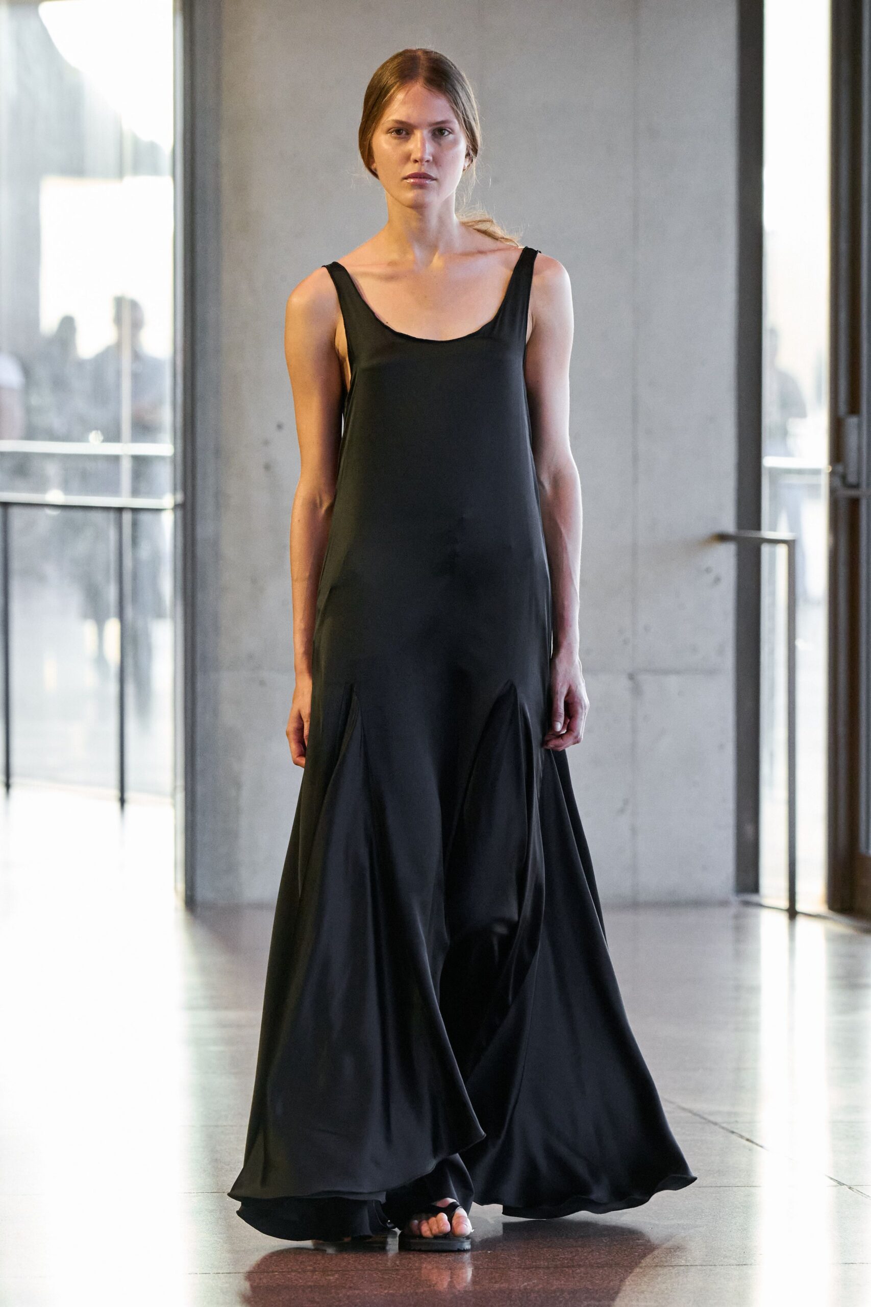 black silk sleeveless v-neck fitted flowing maxi gown