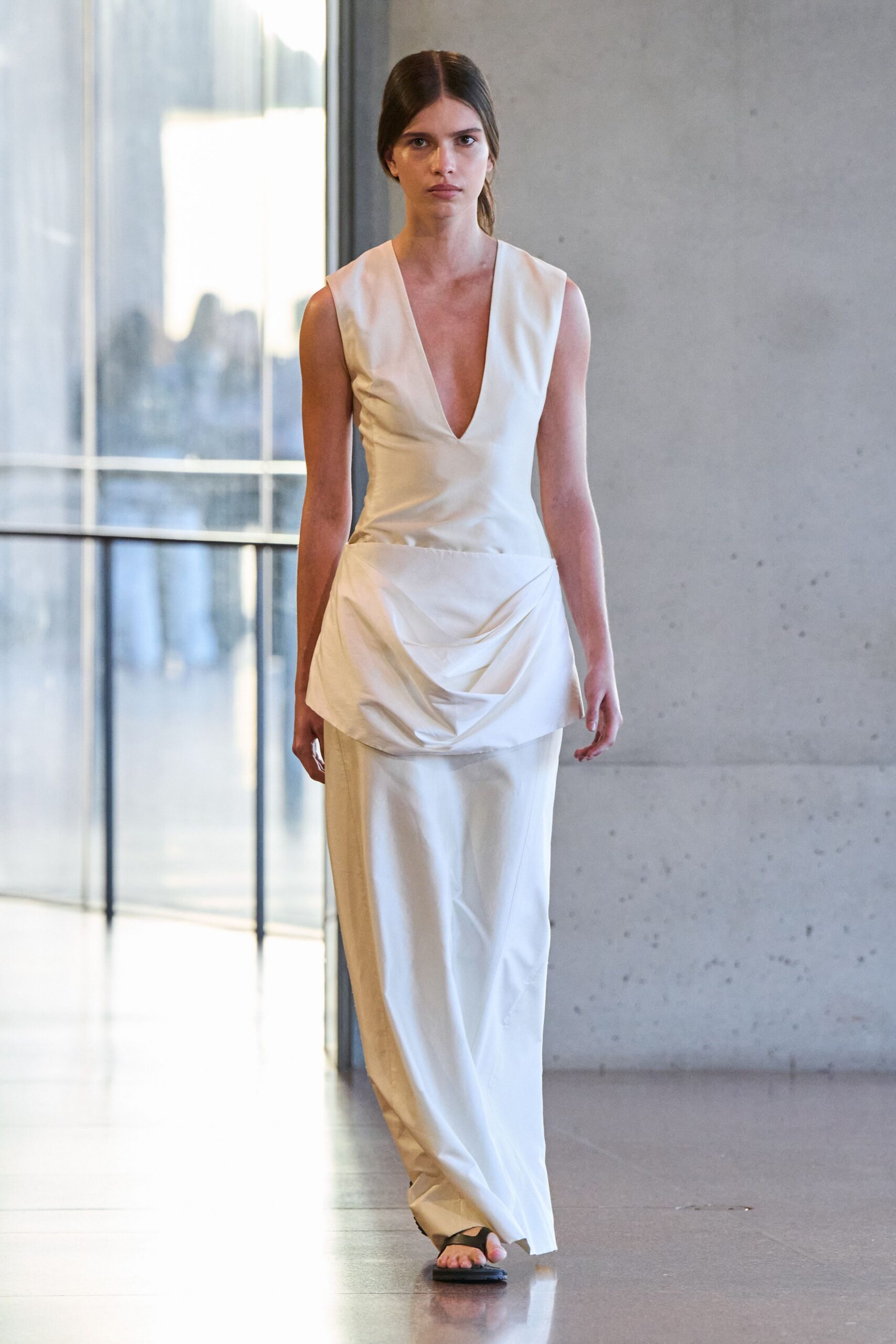 white silk sleeveless gown